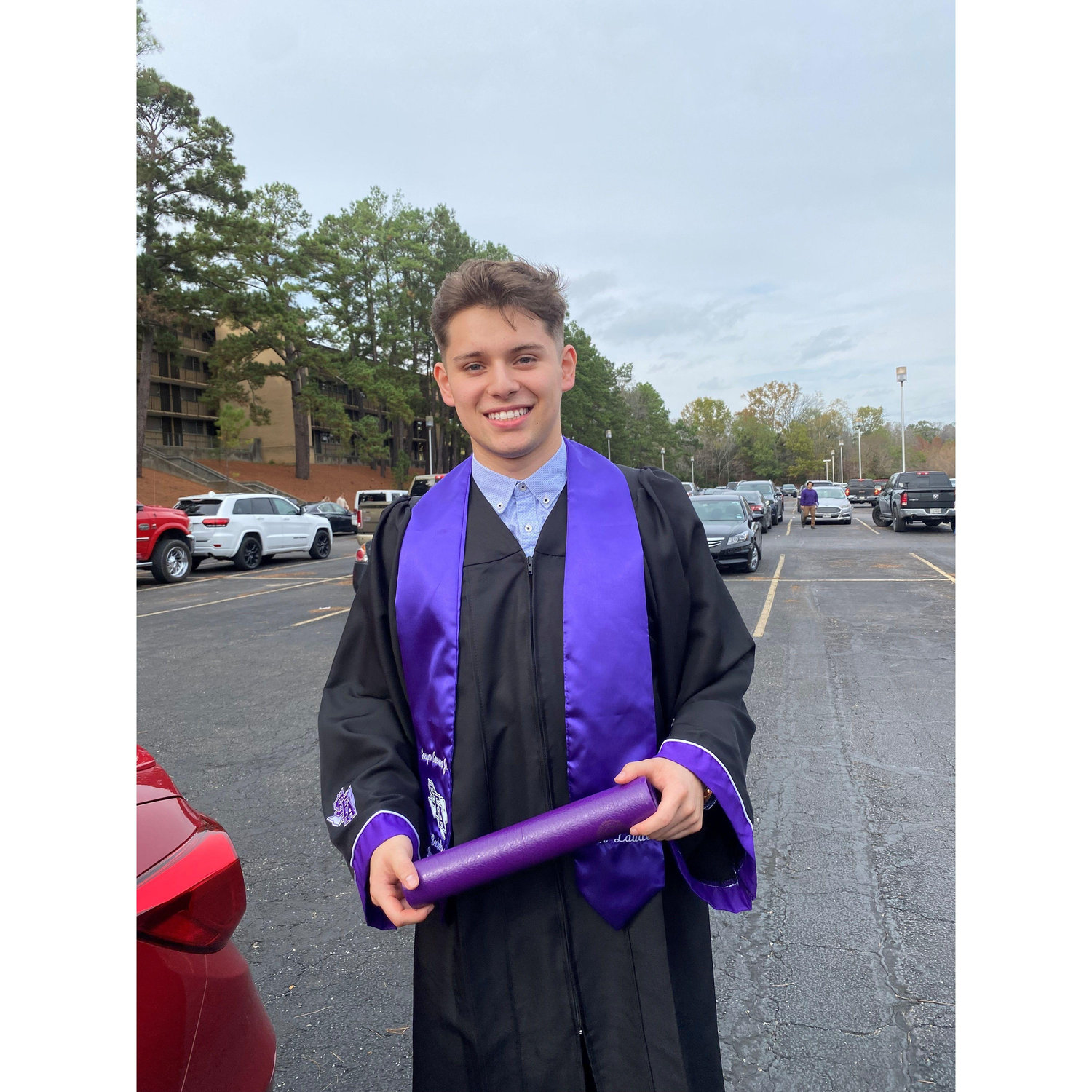 Gaspar graduating with his Bachelor's