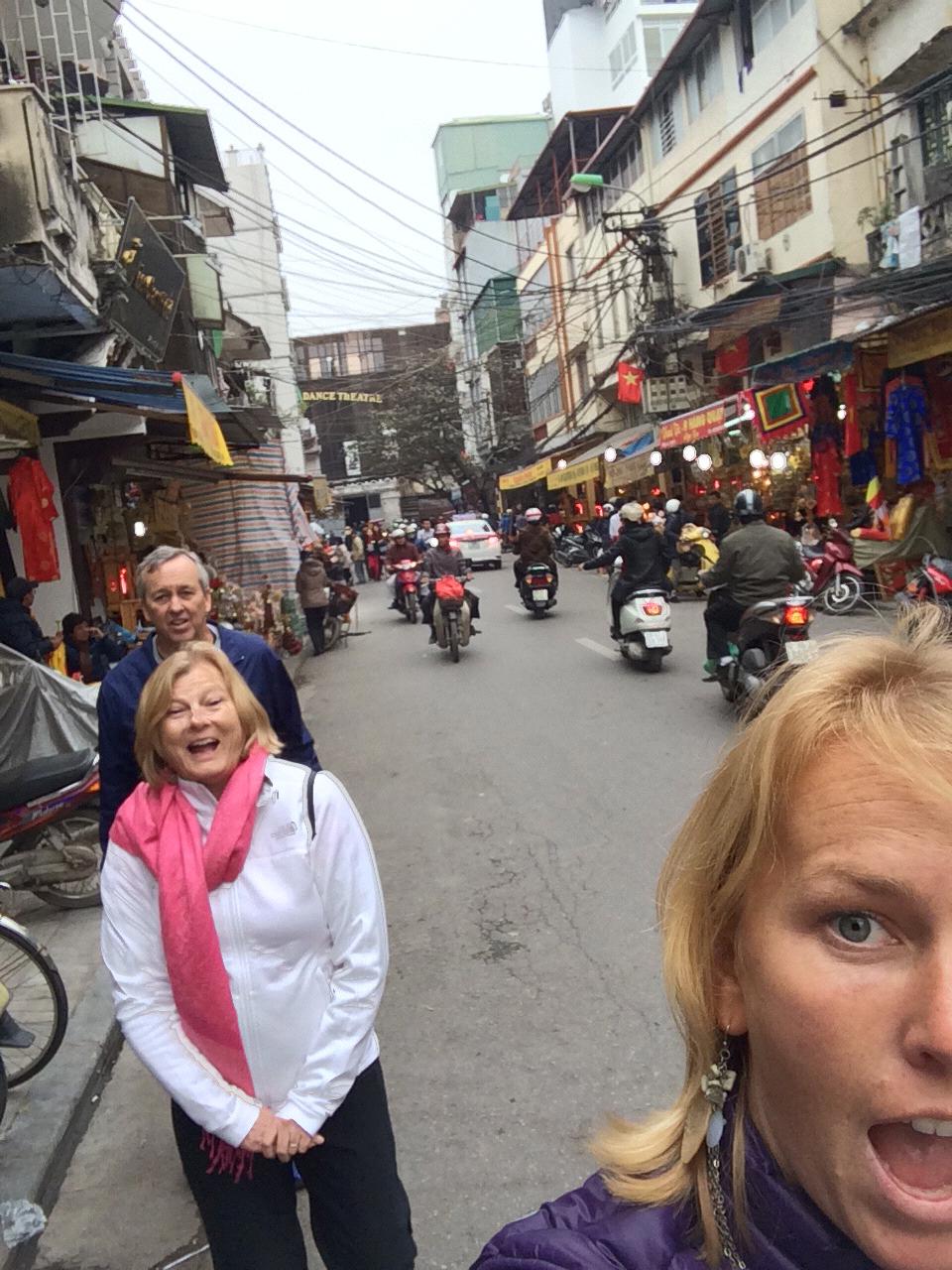Jill and her parents in Vietnam