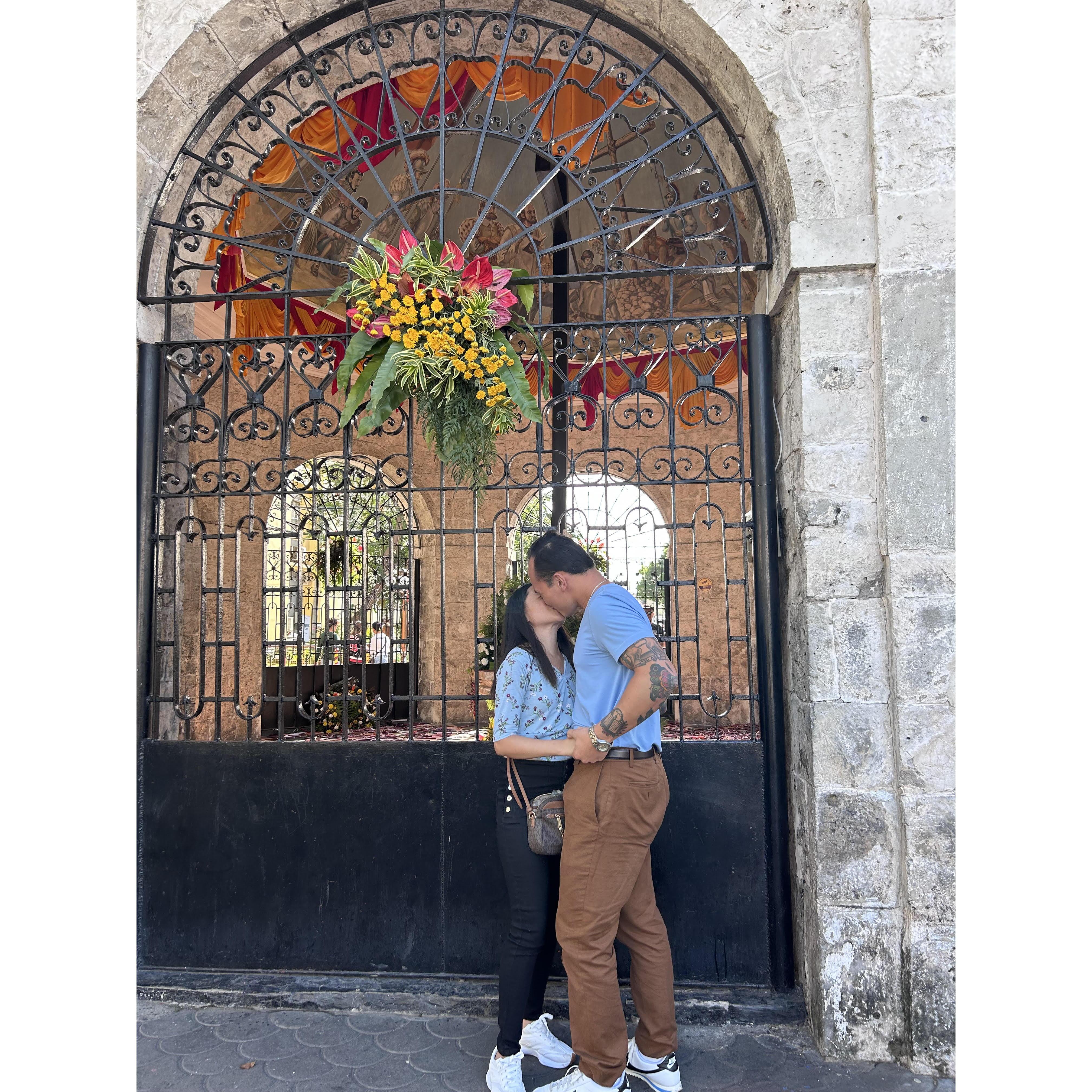 Their first kiss after becoming engaged!! At Magellan's Cross in Cebu City.
