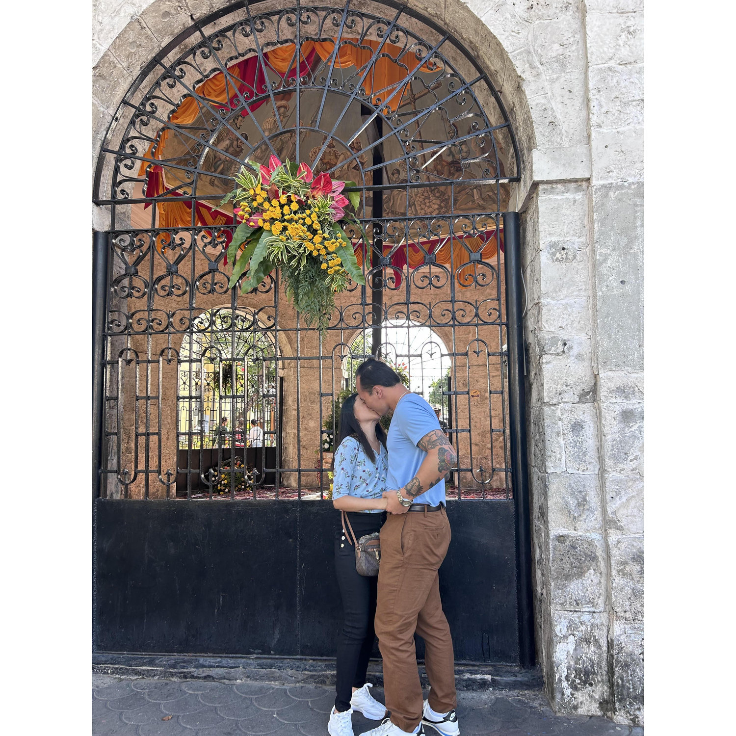 Their first kiss after becoming engaged!! At Magellan's Cross in Cebu City.