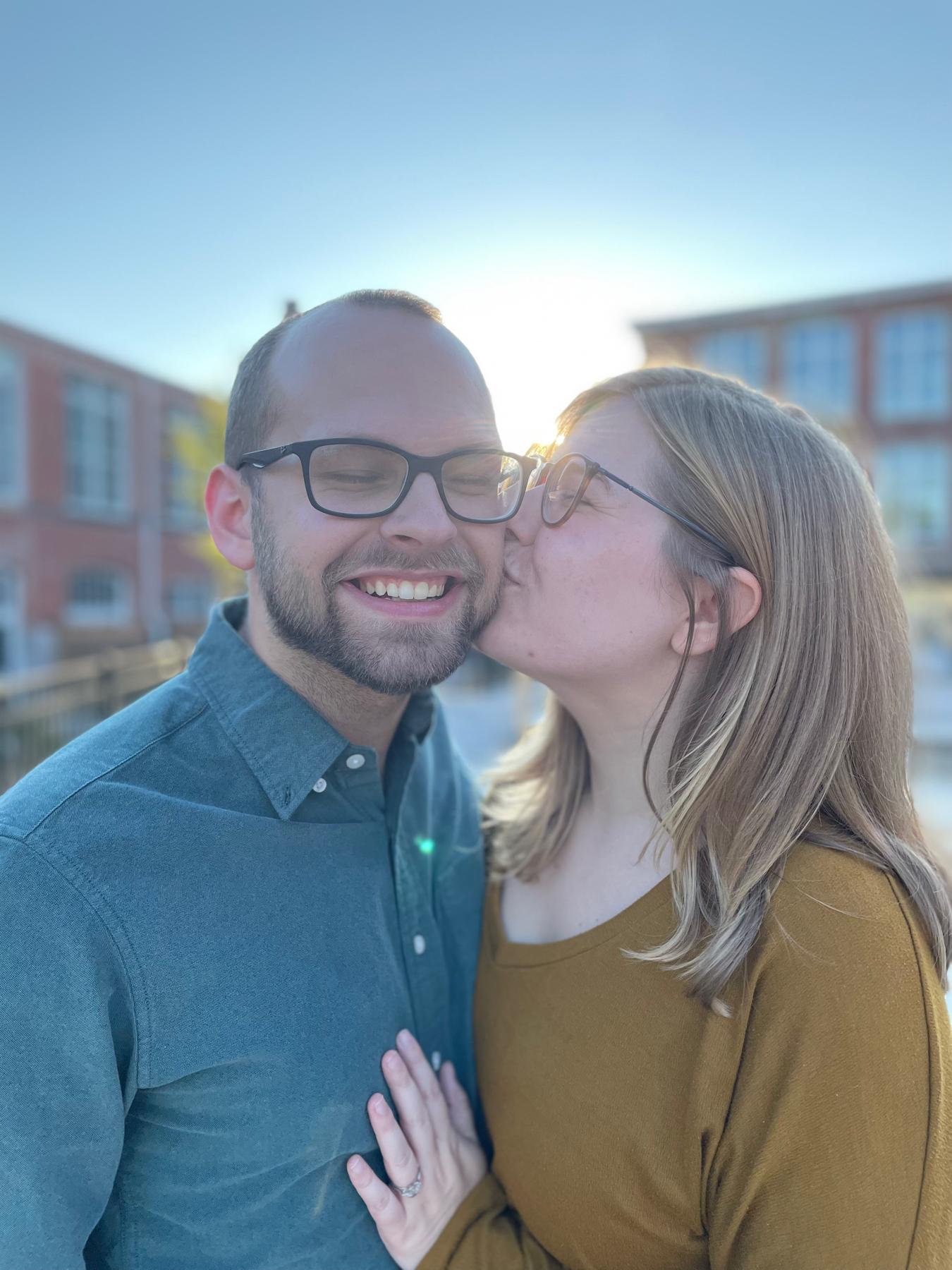 Another photo by Raven right after our engagement. Our apartment complex/ wedding venue can be seen in the background!