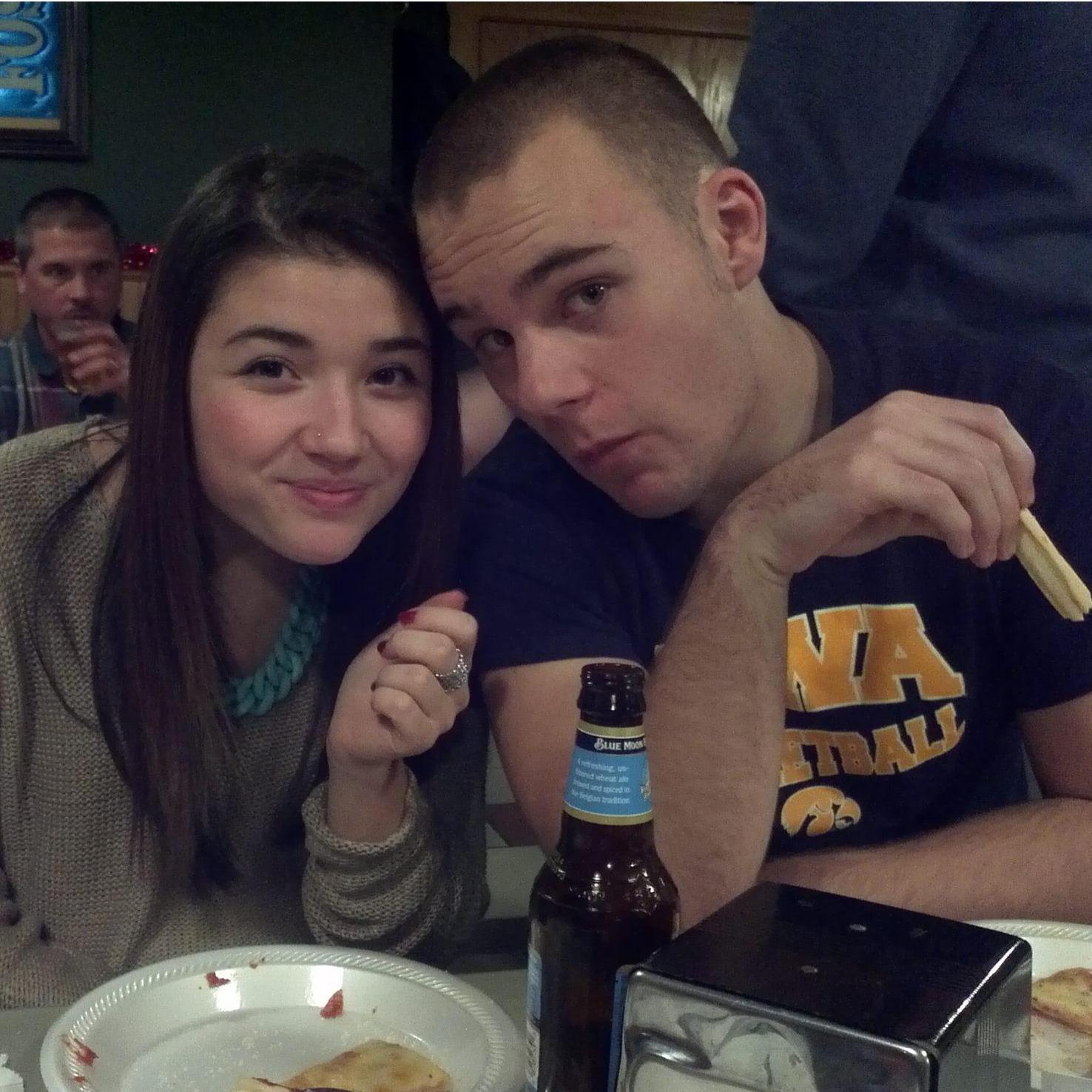 Enjoying Ach 'n' Lou's pizza