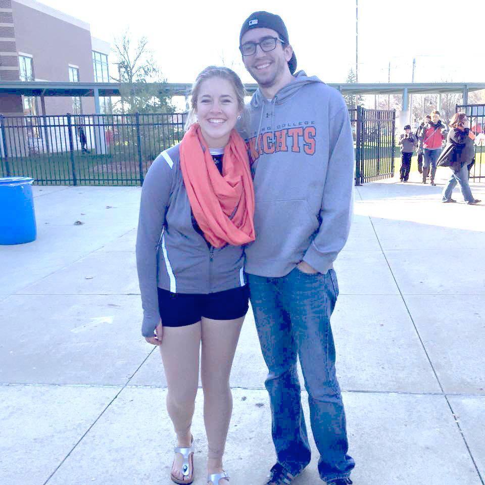 Jon cheering on Carly for her dance team performance