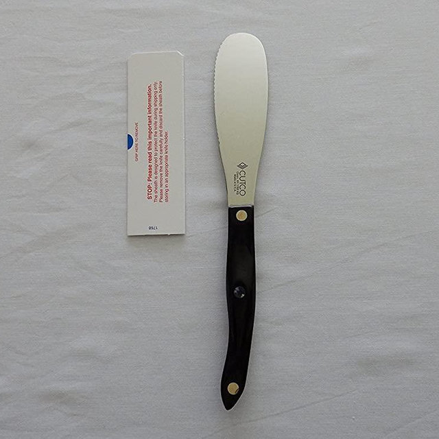 CUTCO Model 1768 Spatula Spreader. . . . . 4.9" Double-D serrated edge blade..............5.1" Highly engineered thermo-resin handle in Classic Brown (sometimes called Black).