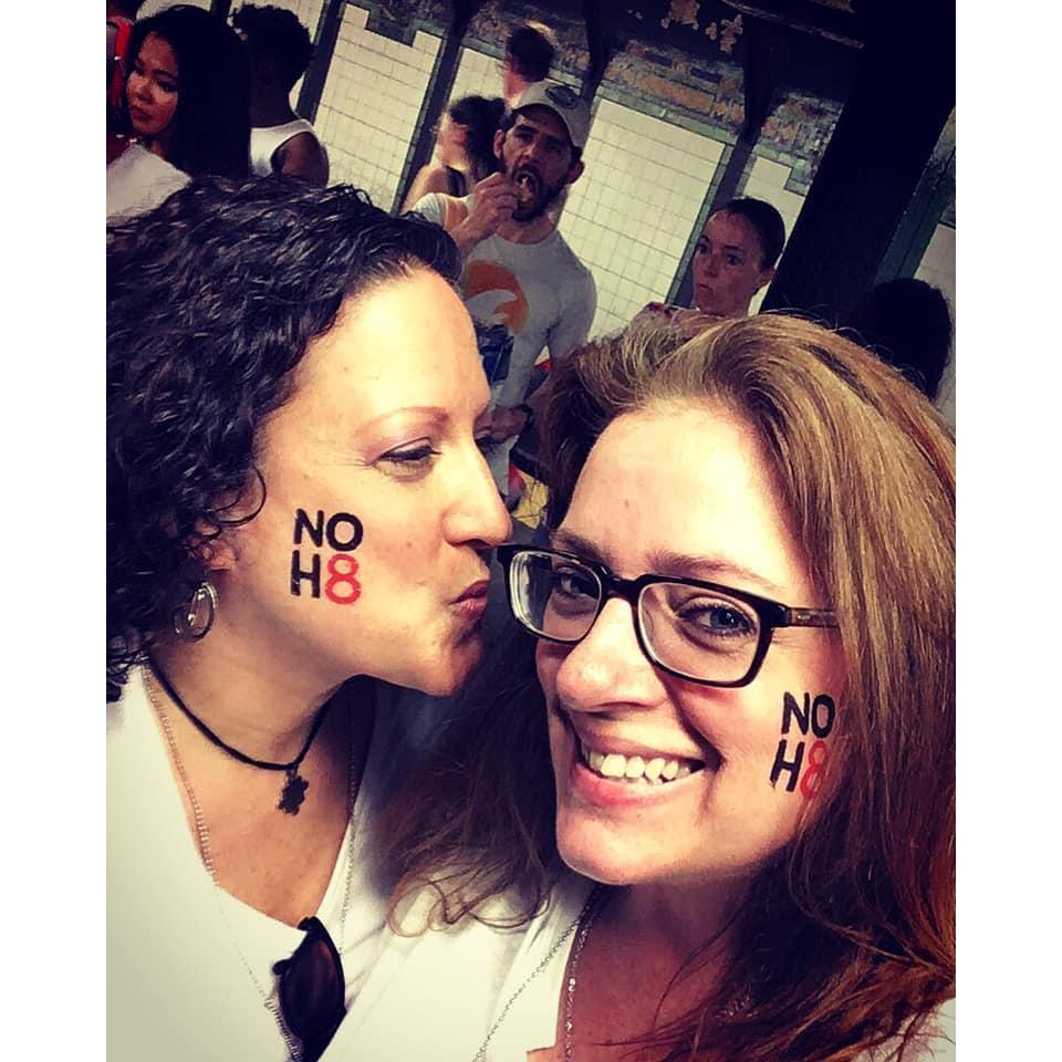 Post NOH8 peck