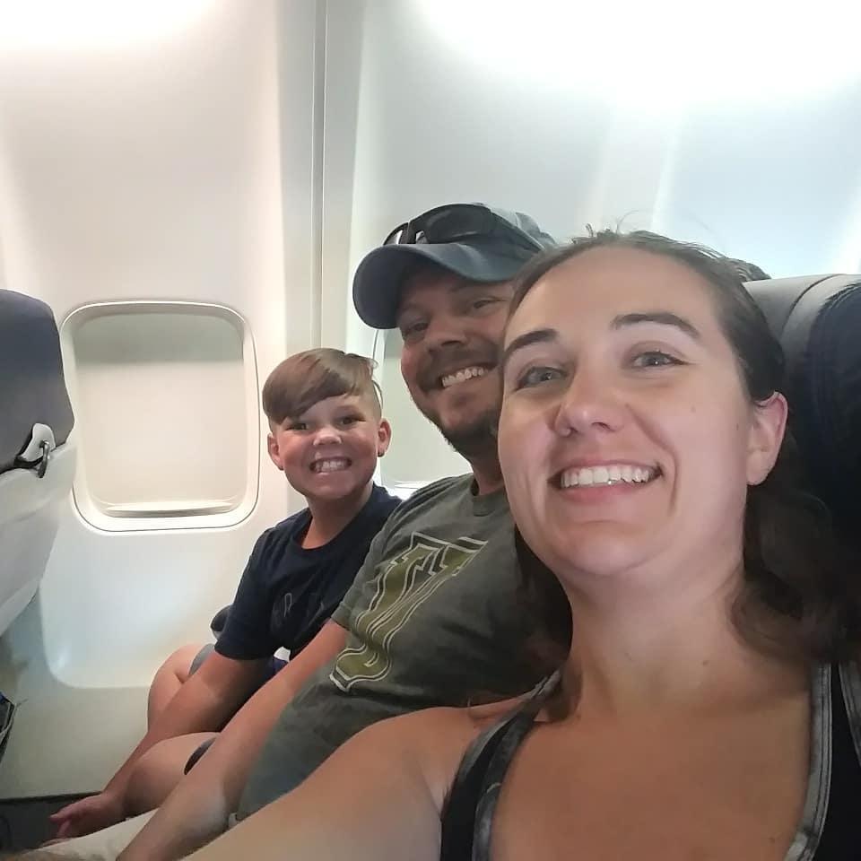 Hayden's first plan ride on the way to my first cruise! July 2018