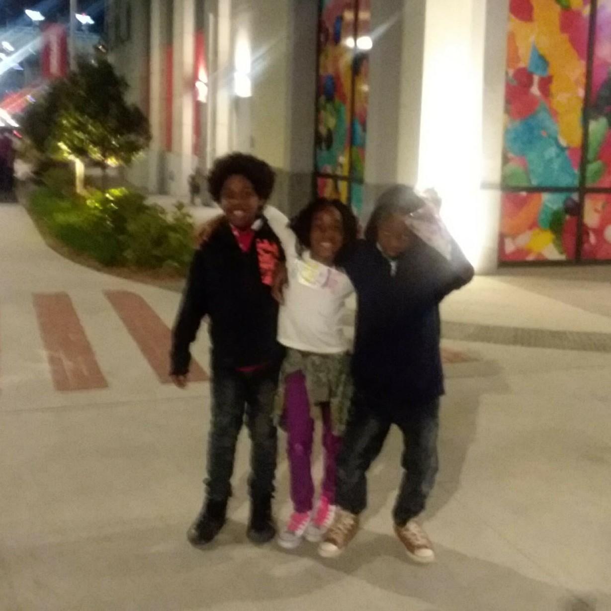 We took the kids to see the new Black Panther Movie. 1 out of 3 kids went to sleep. Can you guess who??? (They have on purple pants)