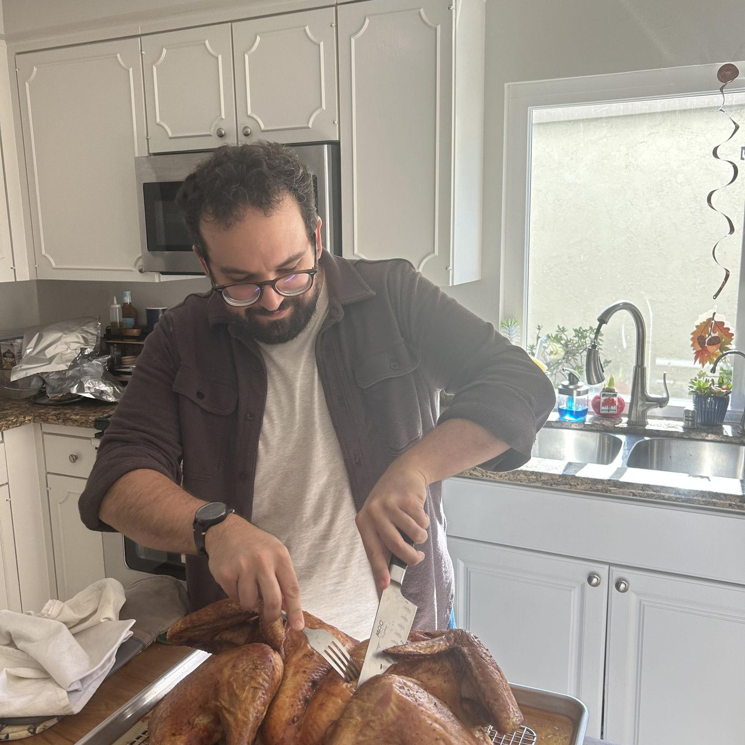 Hosting Thanksgiving for the first time. Steven's Turkey came out amazing!