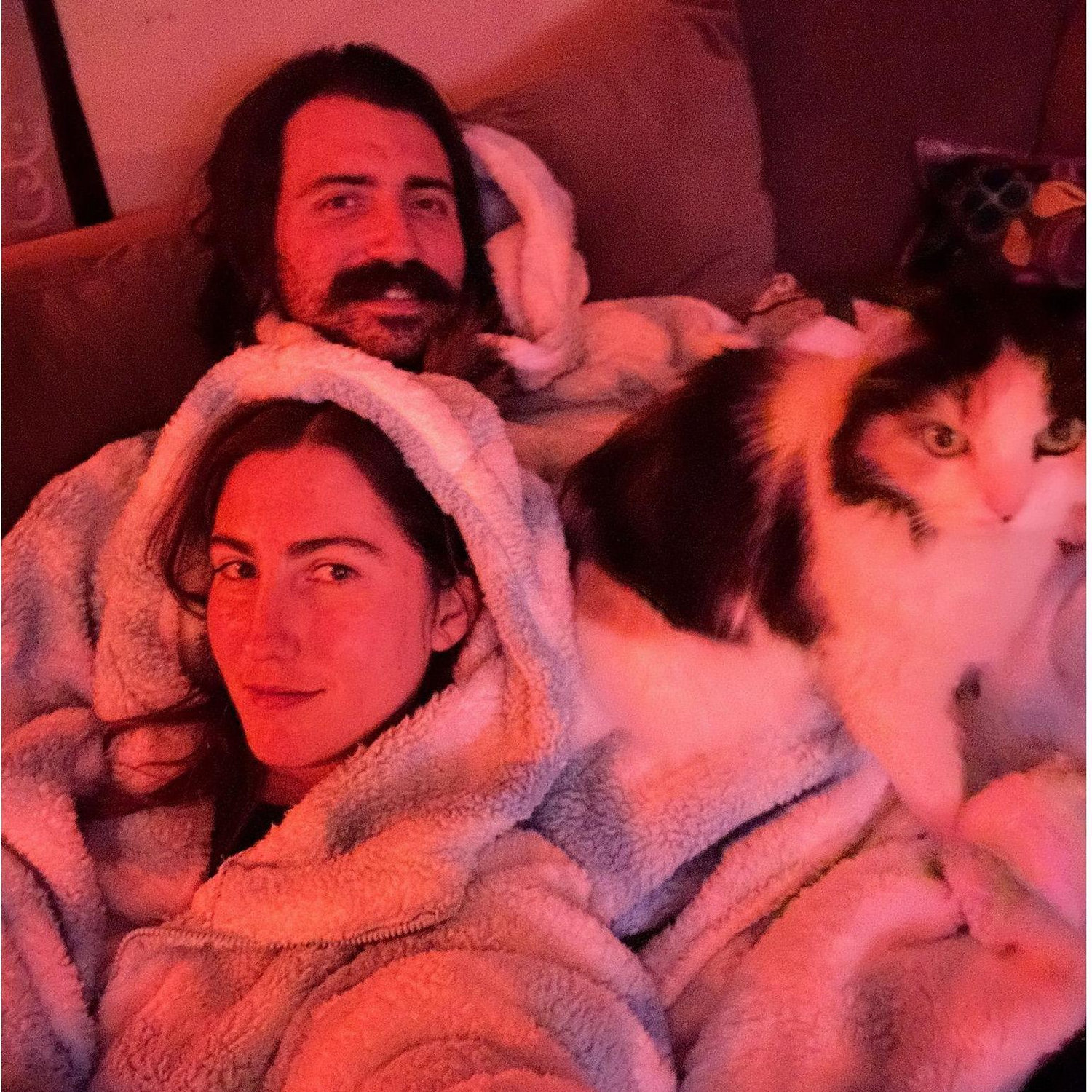 Snuggled up on the couch with their favorite girl Sofie.