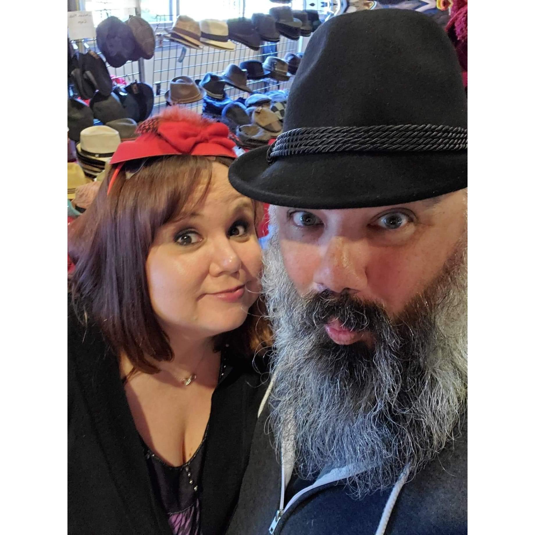 Trying on hats at Volkfest - we do more than just drink beer and eat German food. Kind of..