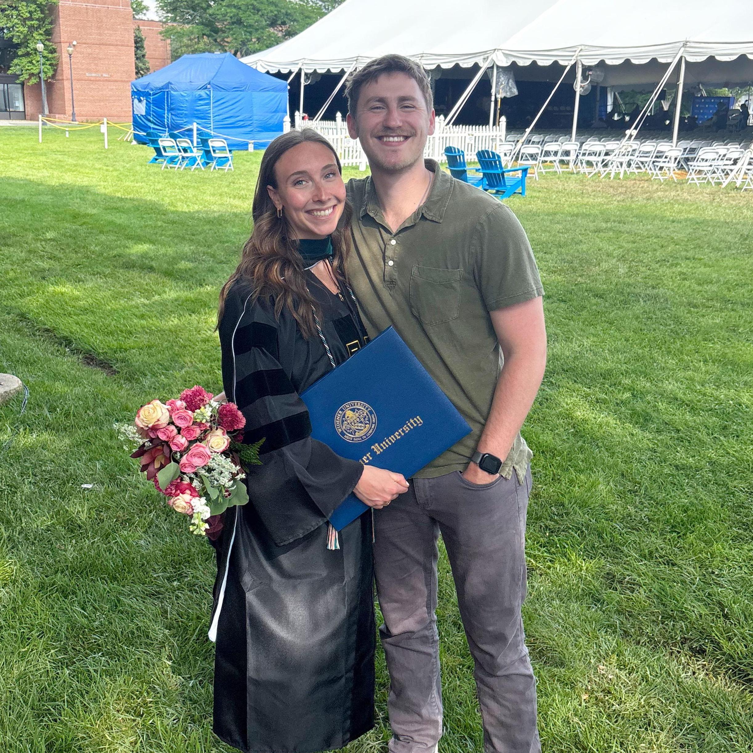 Laura graduated Physical Therapy school in May 2025 with Jake cheering her on