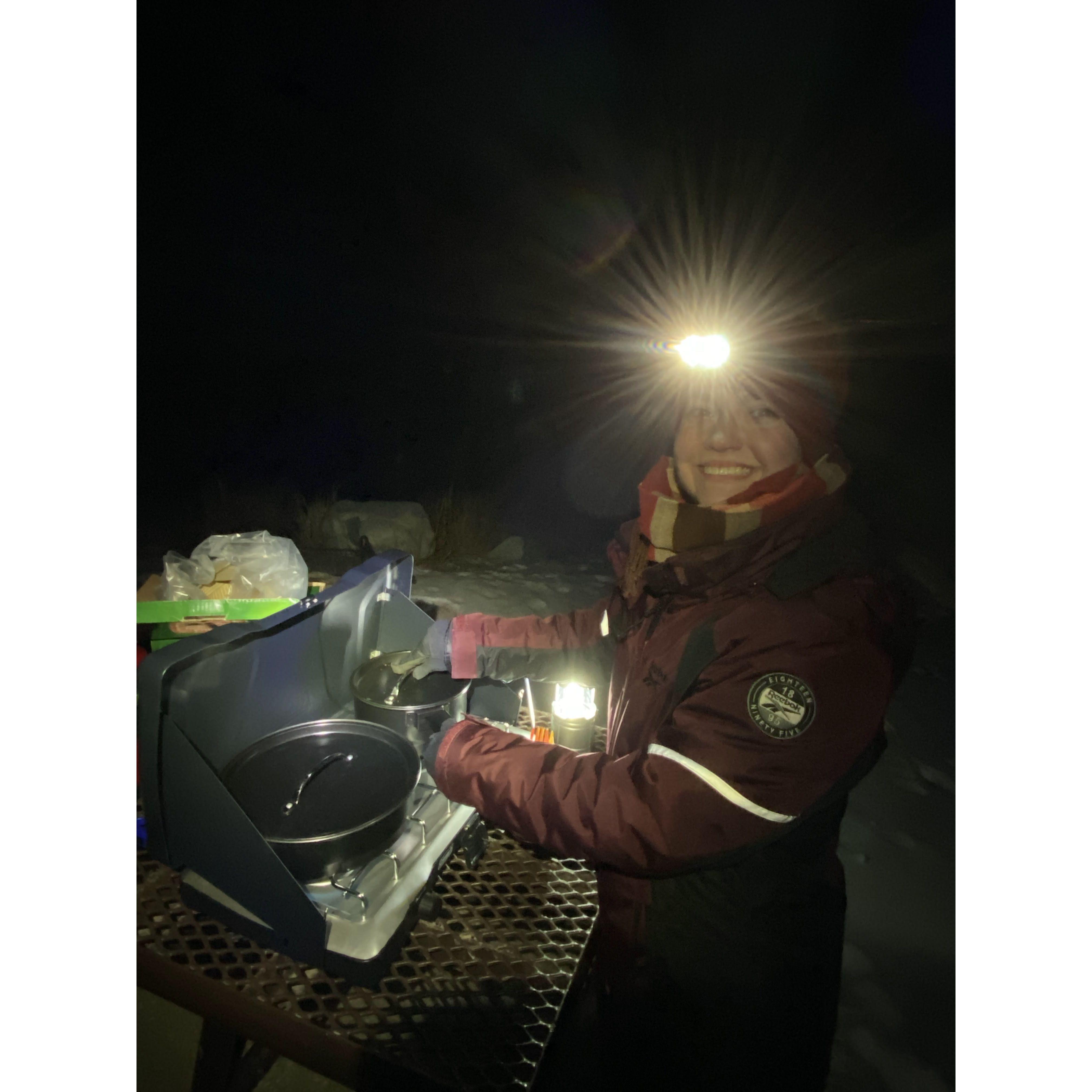 Sam & Cam cooked dinner on their camping stove in 6 degree weather on their road-trip, sleeping in both their van and a tent!