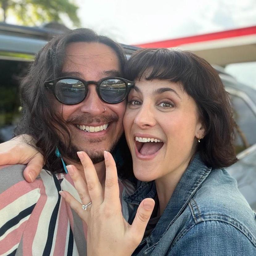 Michael's proposal totally surprised me... he proposed in the same place we locked eyes for the first time.