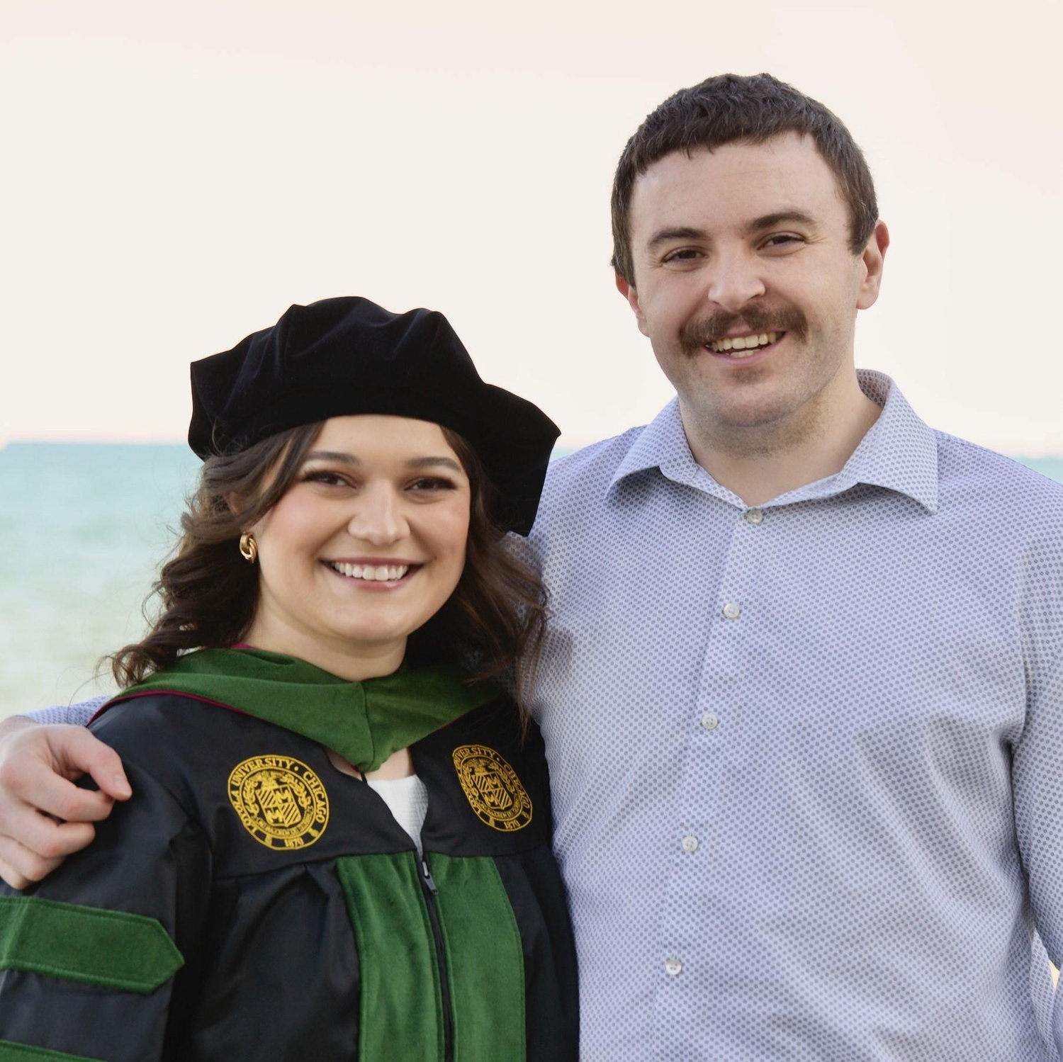 Olivia's graduation from Loyola University Chicago Stritch School of Medicine in May 2024. After graduating, Olivia would move-in with Mike in Kalamazoo and begin her three-year pediatrics residency!