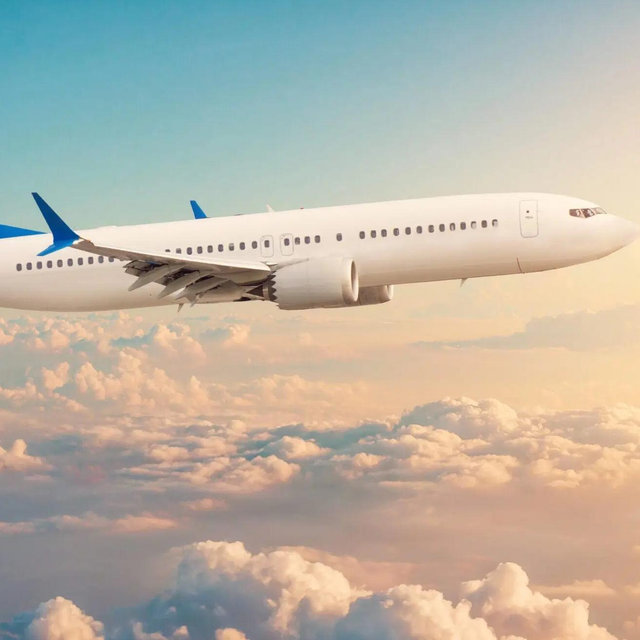 One Round Trip Plane Ticket