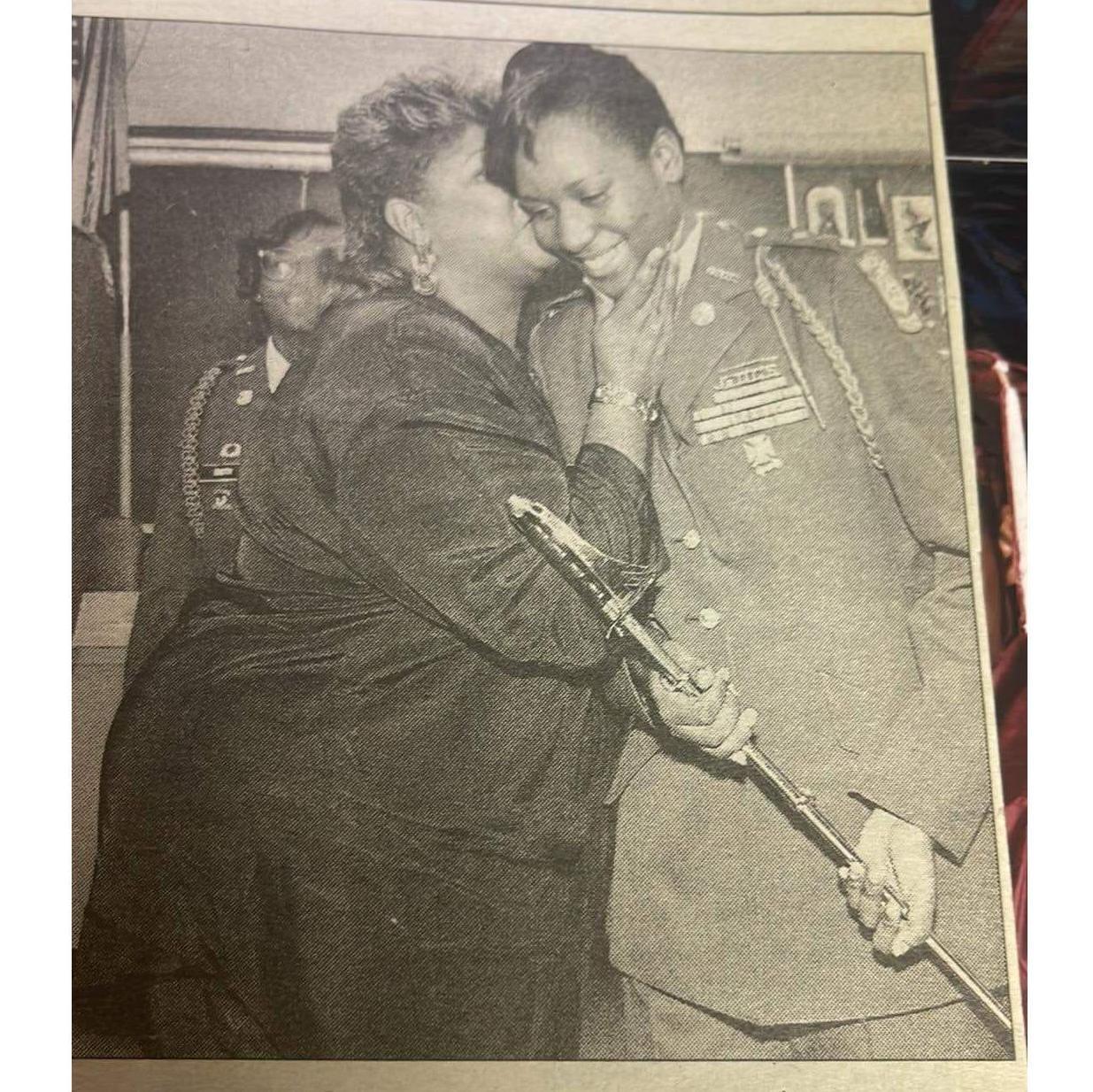 Jokima's mom kissing her when she won Brigade Commander of Gary High Schools in 1992!