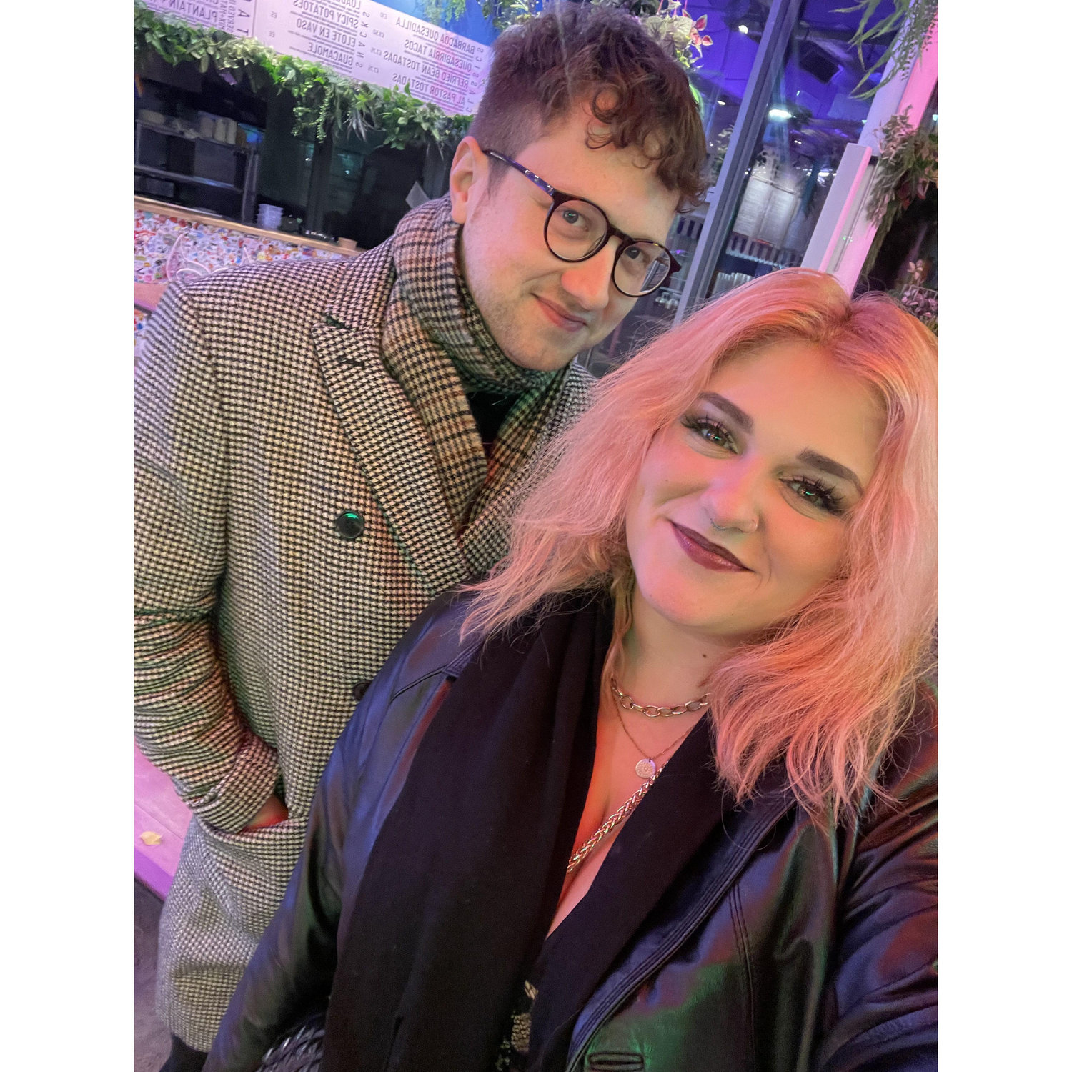 first selfie!!!! in edinburgh street food <3 kieran had to shave his beard for work and madeline had cotton candy hair LOL who are these people