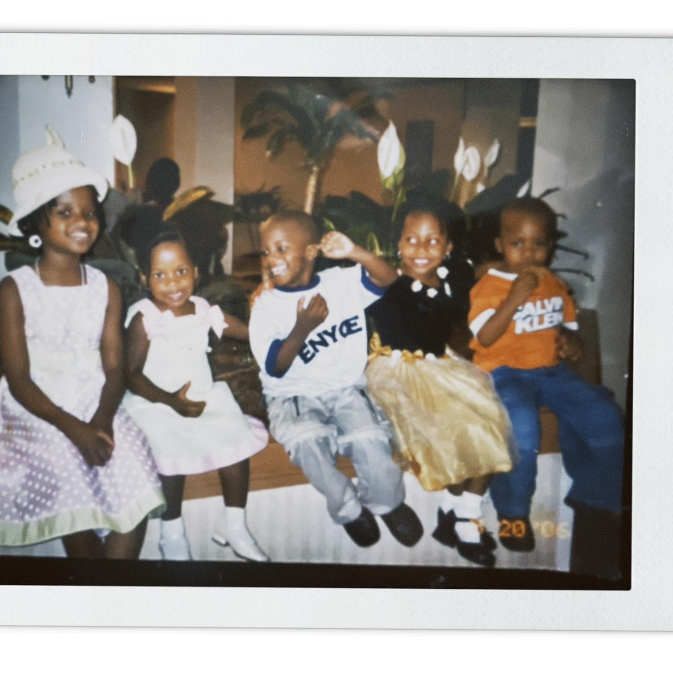 Preye and her cousins at a hotel party. Left to right: Riyyah (cousin), Sarah (cousin), Mosheh (cousin), Preye, and Sage (brother).