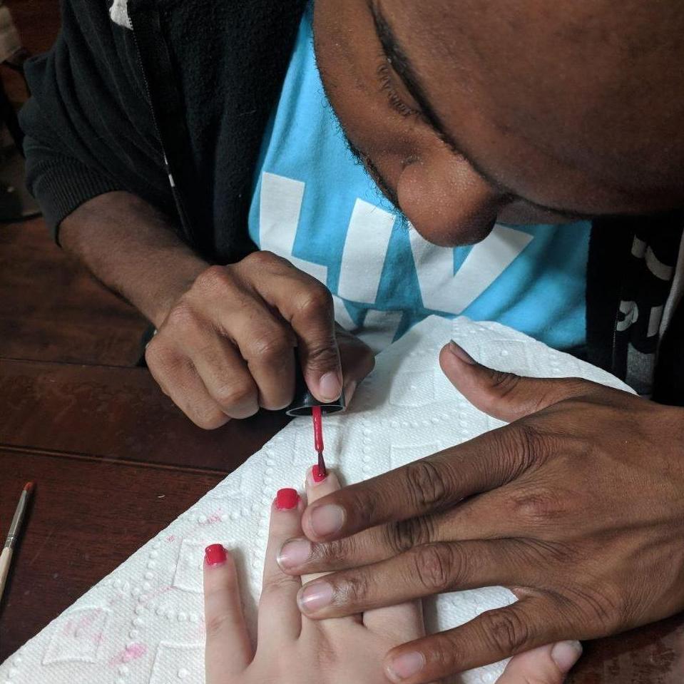Daron has such a servant's heart and was determined to paint Teleia's nails! He was very careful and took his time to make it as perfect as possible. This is during...
