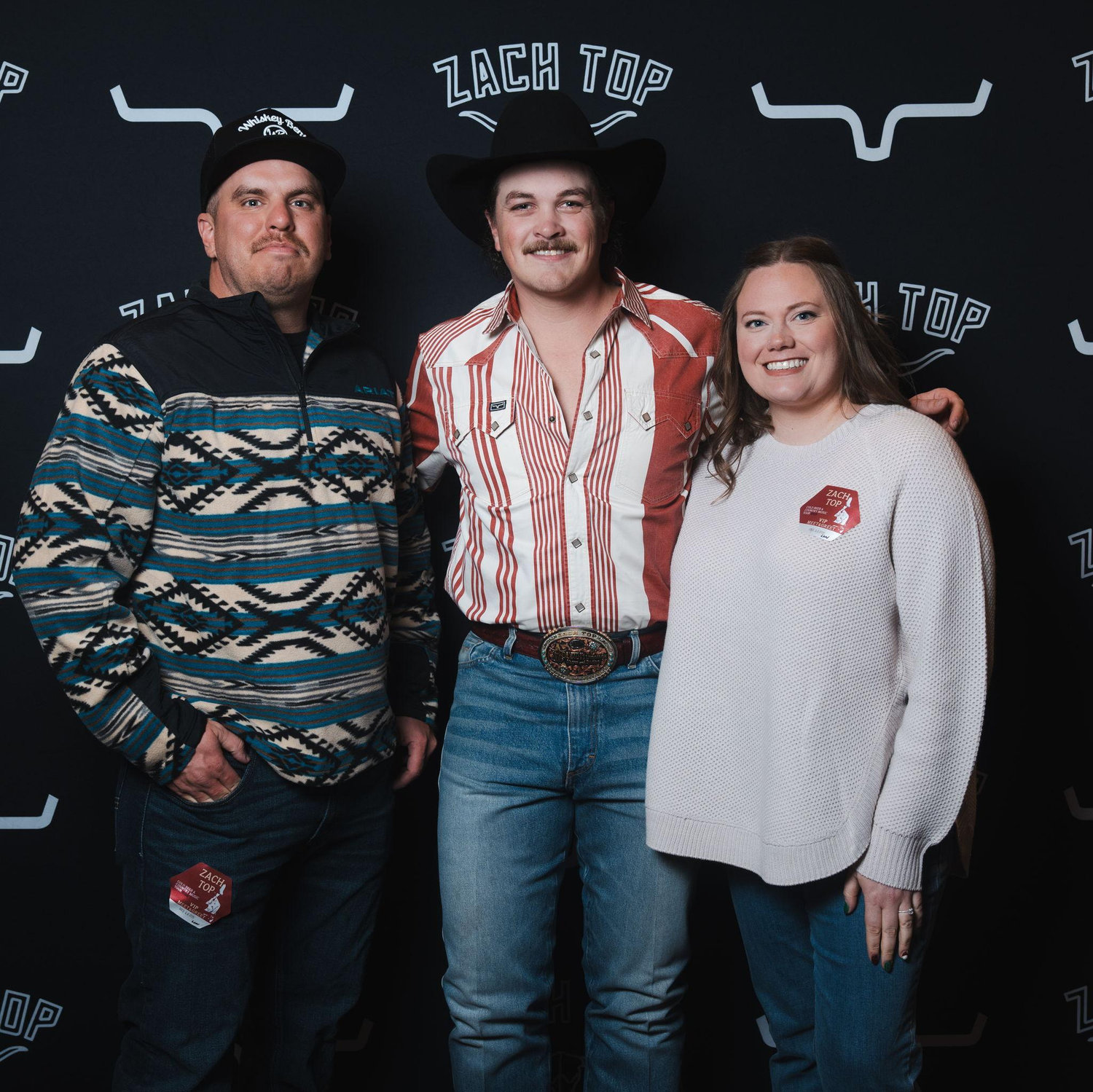 This was us meeting Zach Top, who sings our wedding son.