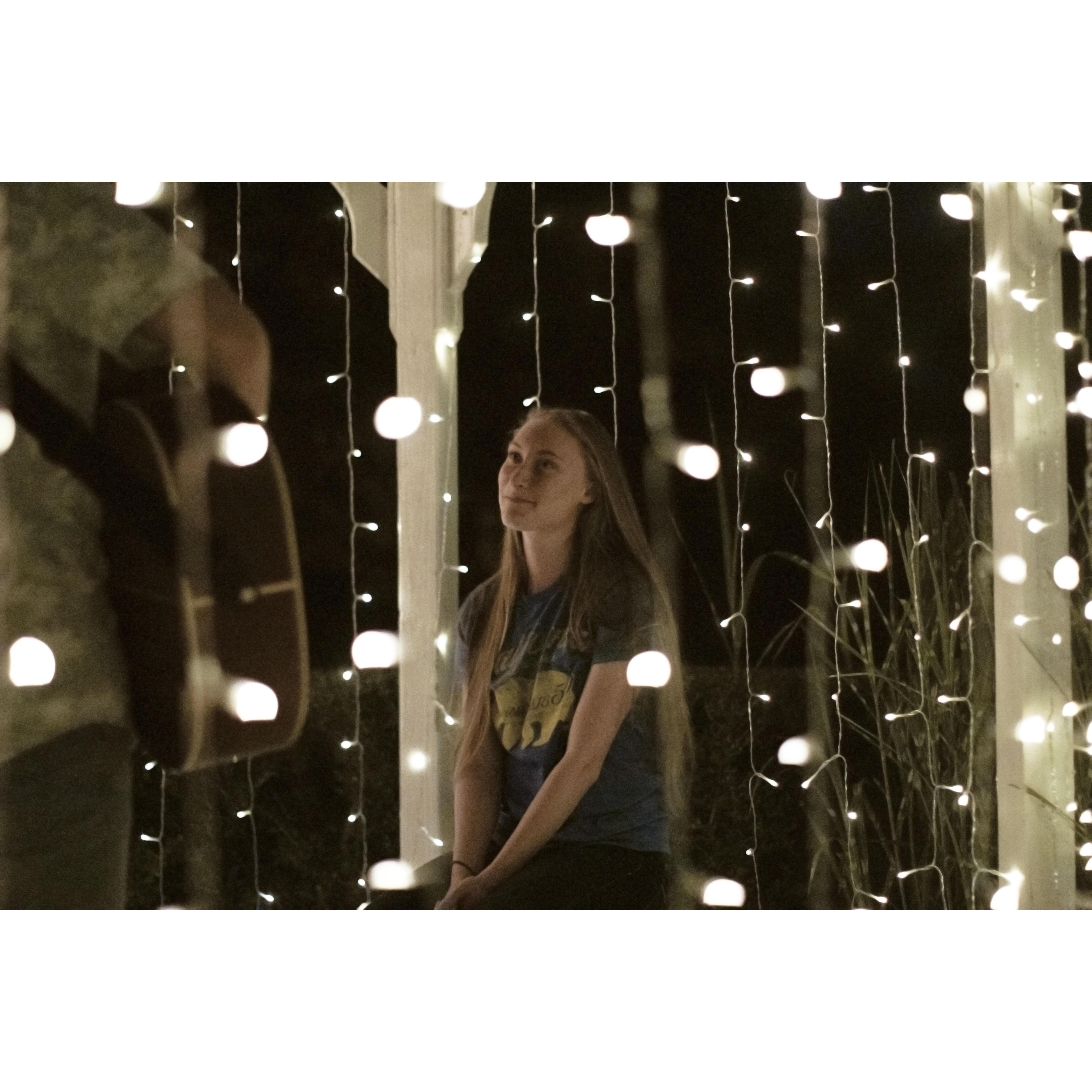 Ilia proposed through song in a lit up gazebo <3