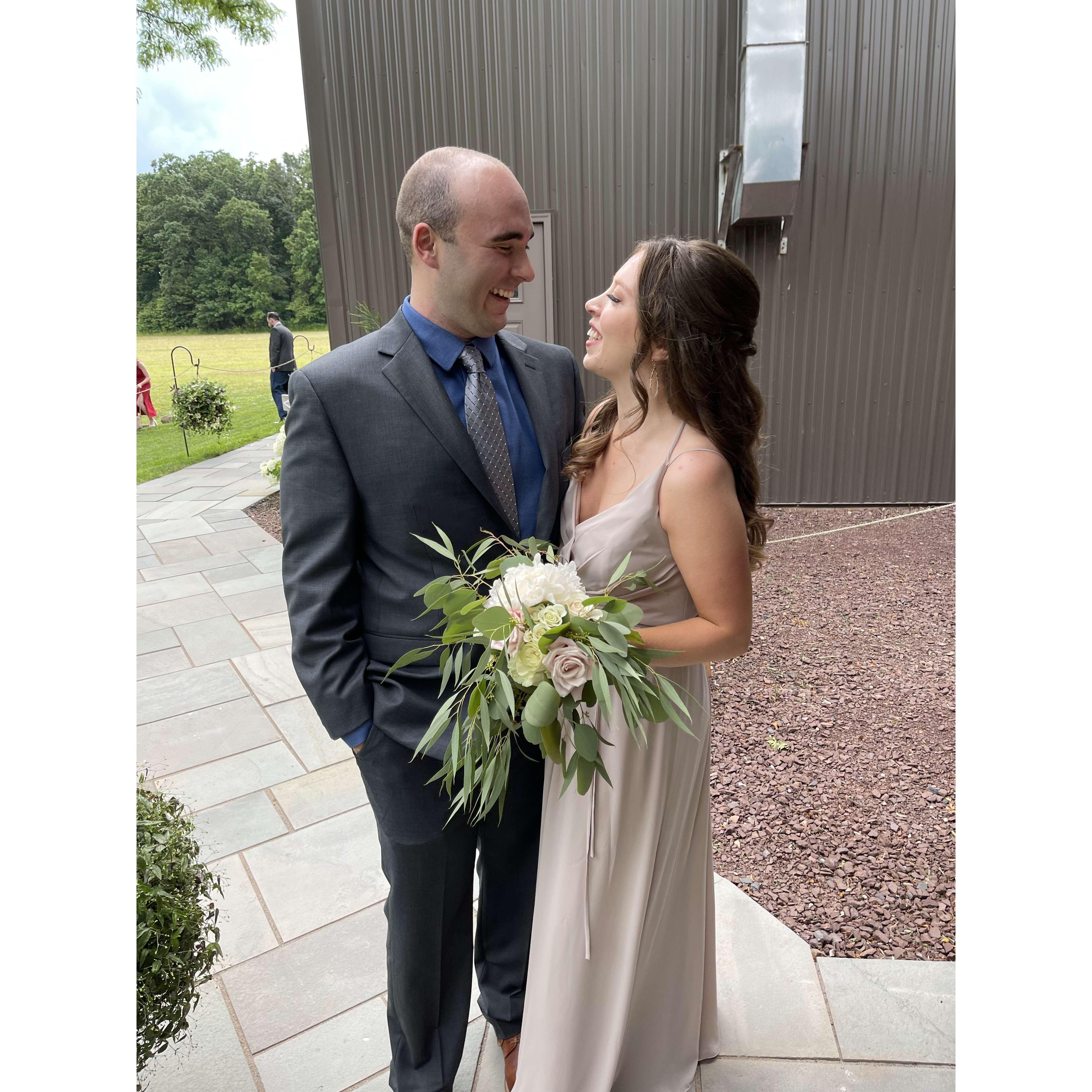 Our first photo together, taken at our friends Jess and Elijah's wedding. Still one of our favorite photos together, ever! 
