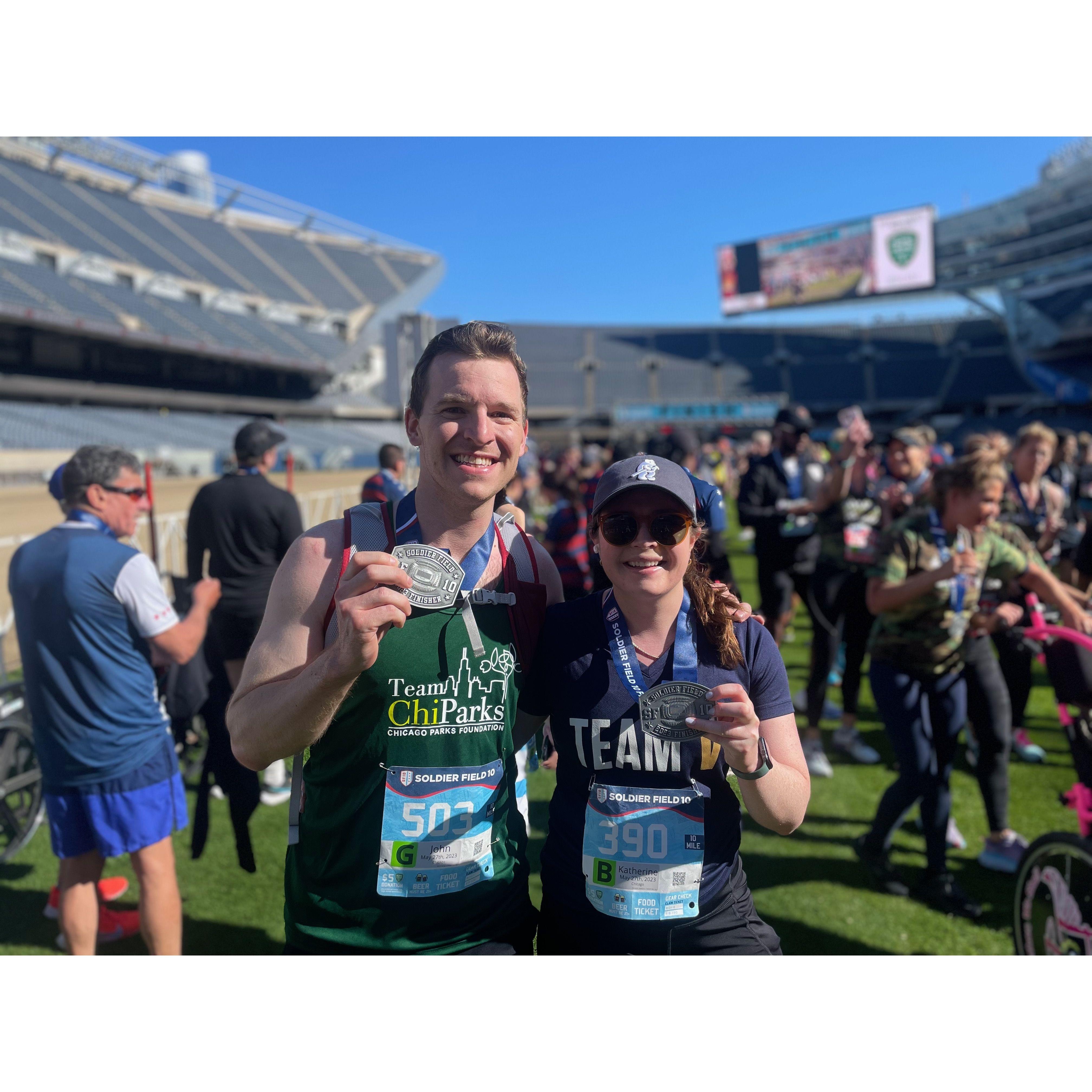 The morning that John proposed to Katherine, they both ran a 10 mile race that ended in Soldier Field!