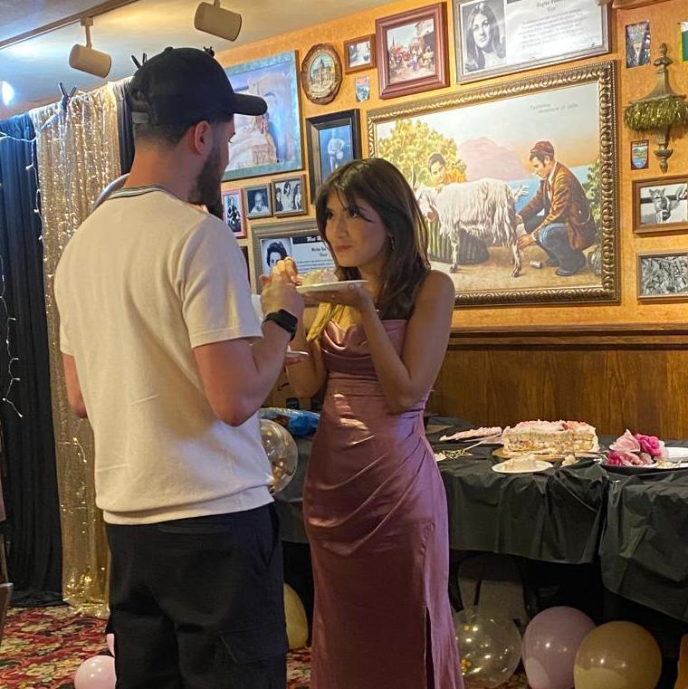 Eating cake at Grad Celebration