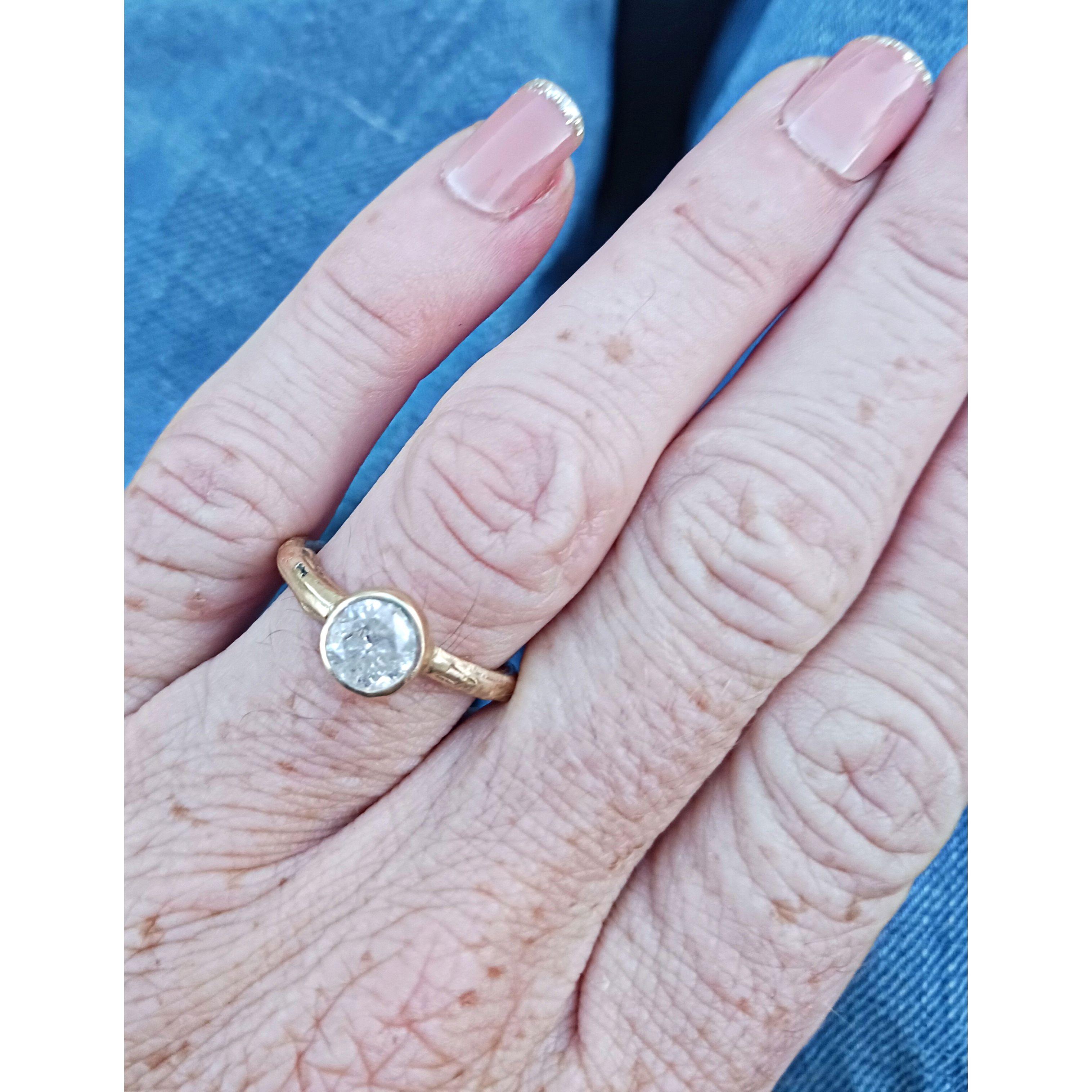 My engagement ring is very special because my cousin Kate Furman made it. Dougie did good!
