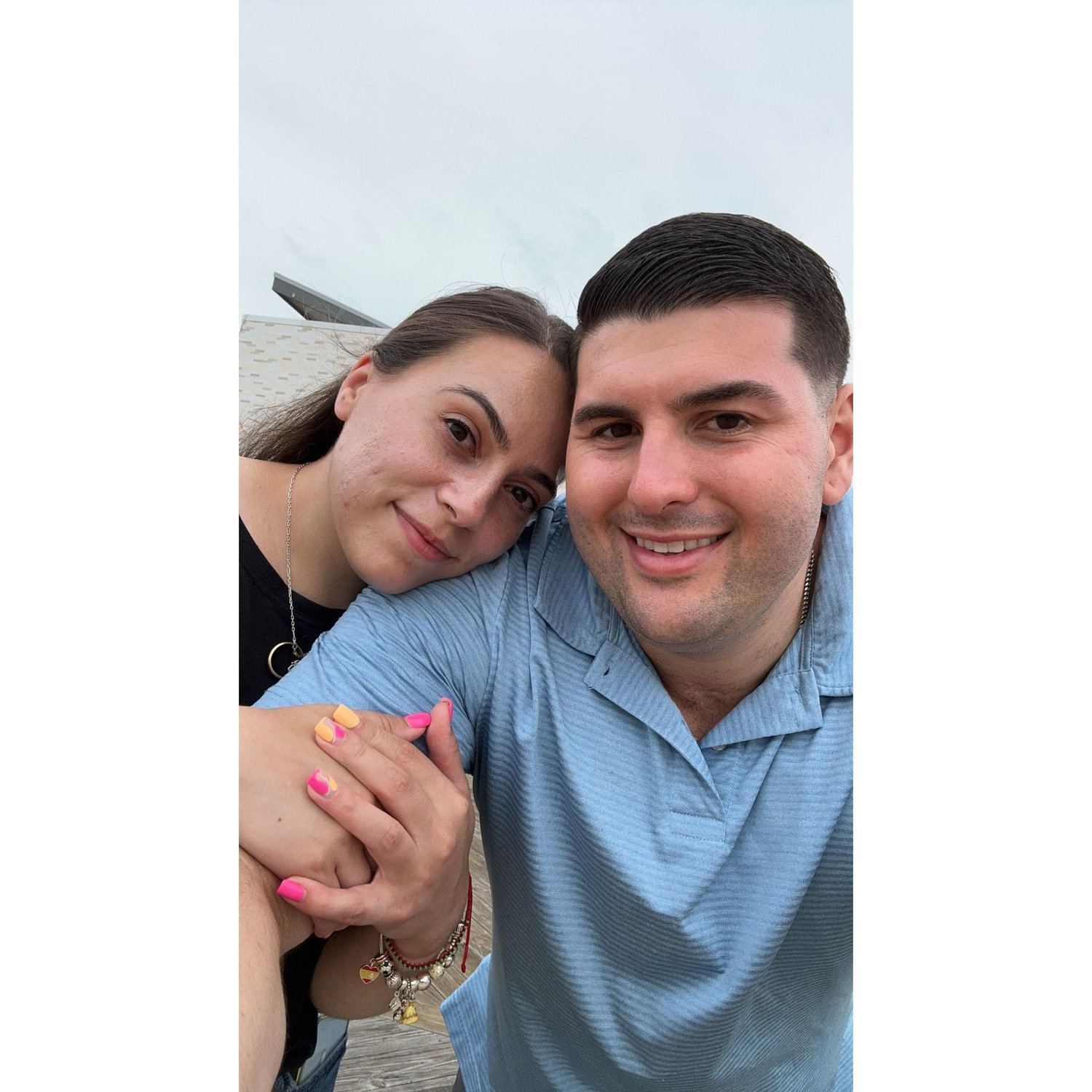 Of course we had to try to recreate our first photo together on our anniversary!  After many  trips up and down the board walk trying to find the spot..this wasn't the place we took the picture! Oops!