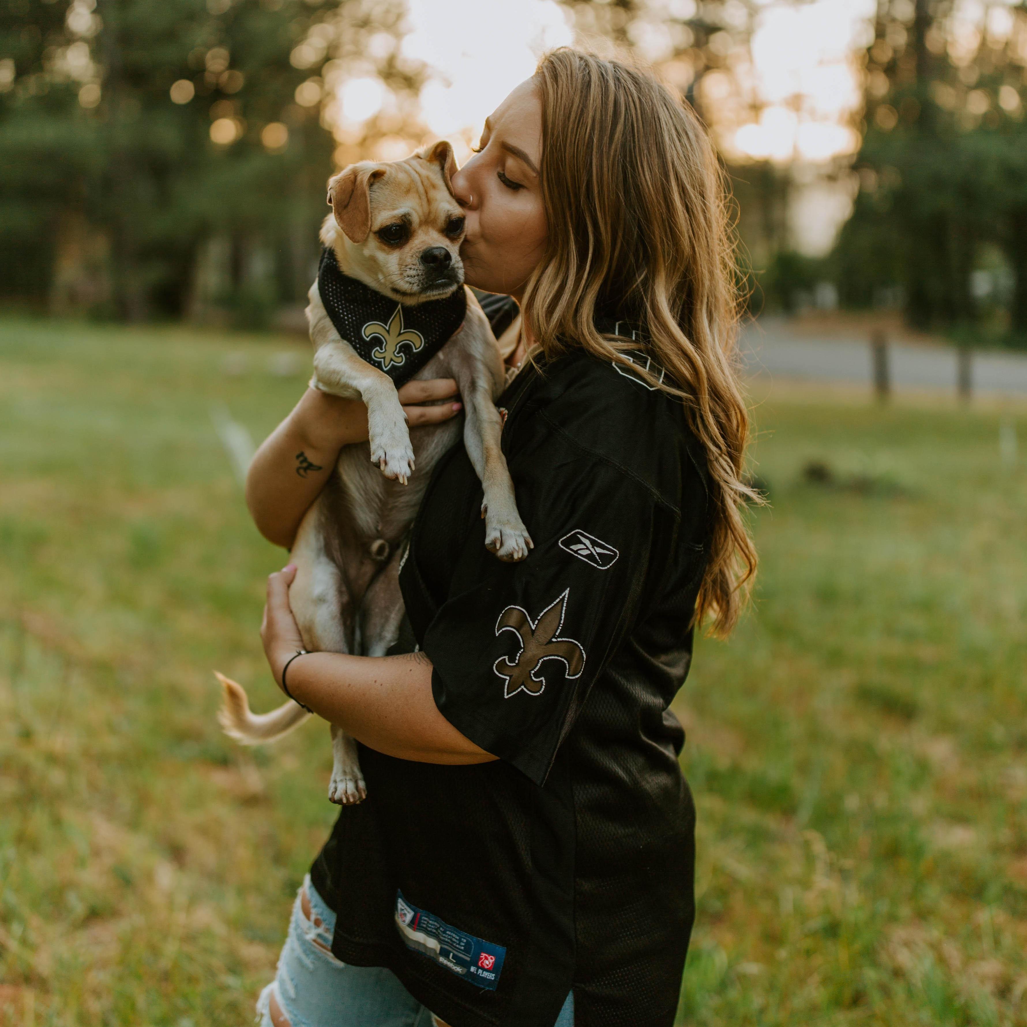 Kenickee is Maloree's puppy and took after her and her papa in being a Saints fan