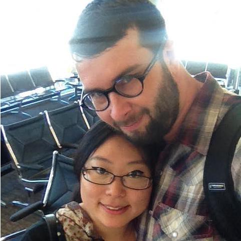 Waiting at the airport together.