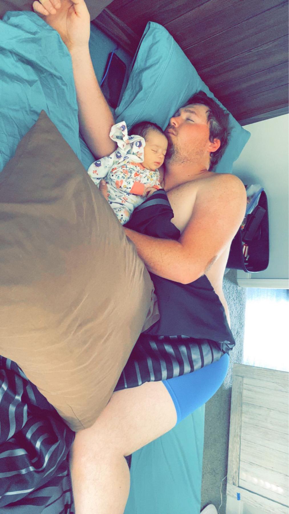Daddy’s first nap with his monster