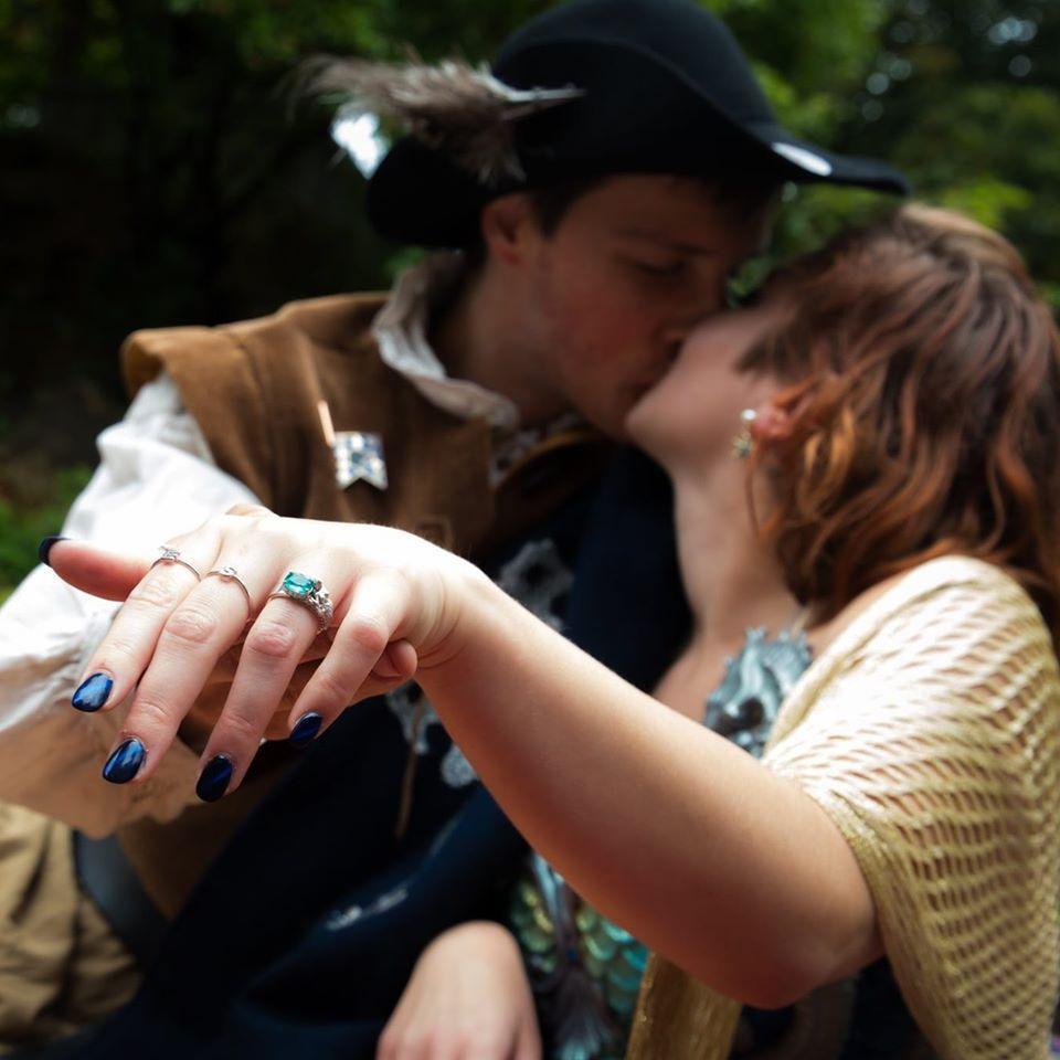 One of their proposal pictures! She had three rings on three different fingers that said Y E S