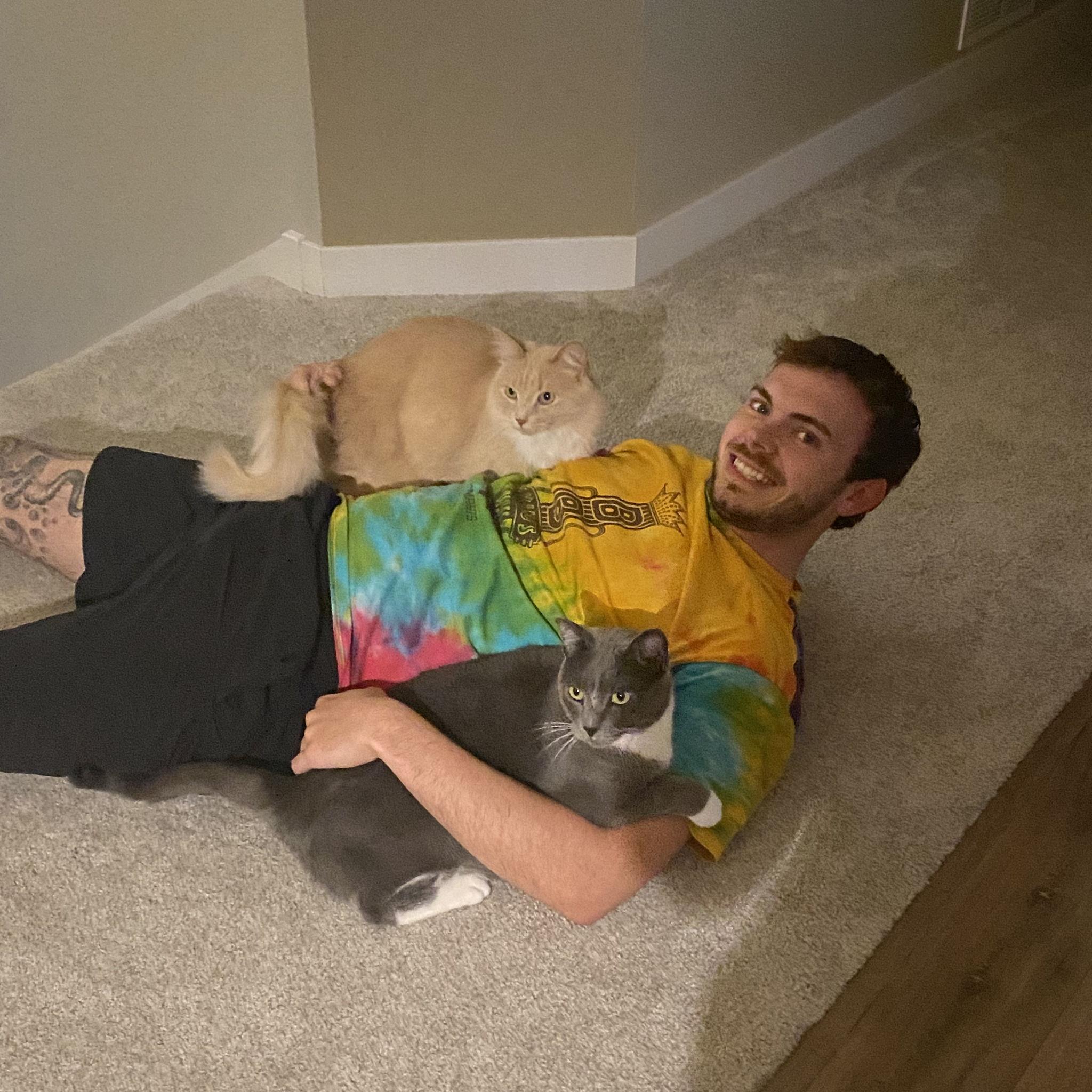 Even though Mac is allergic to cats, it has never stopped him from loving on my babies! He is the best cat daddy! :)