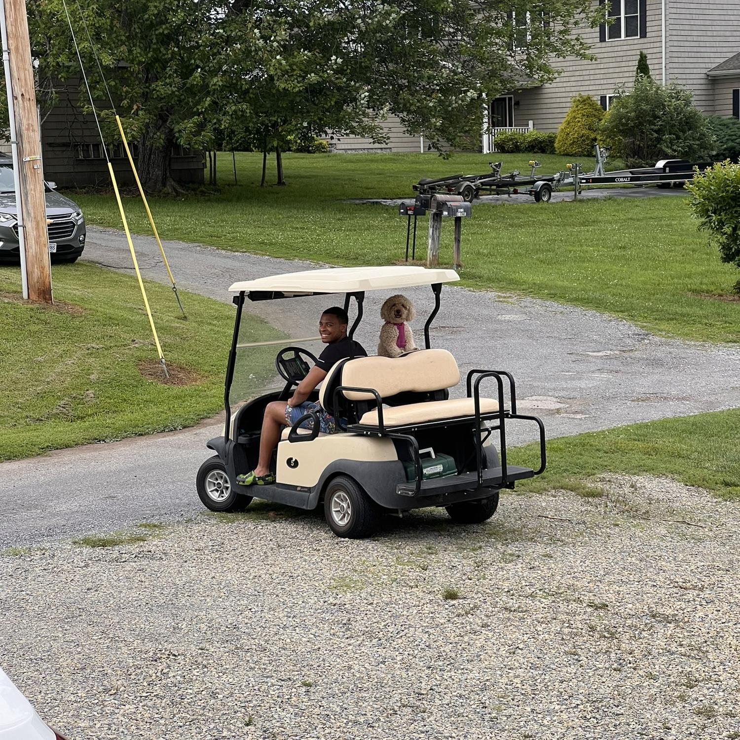 One of Kirk's first trips to the lake.  Of course he had to take Luna on lots of golf cart rides!