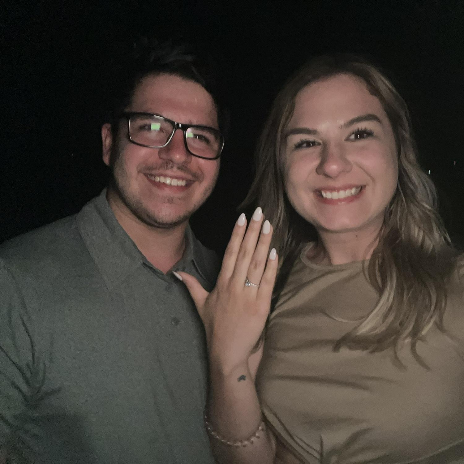 Minutes after he proposed on the beach.