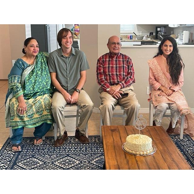 Mohsina's grandparents, Qazi Mahboob Ulhaq and Shahida Mahboob sitting with Dalton and Mohsina