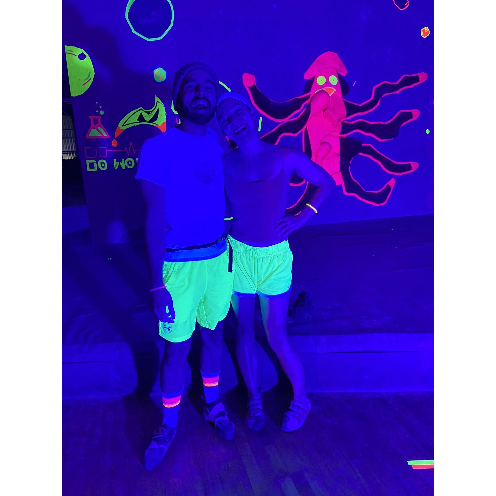 Our favorite Halloween tradition - Reach Climbing's black light rock climbing party!