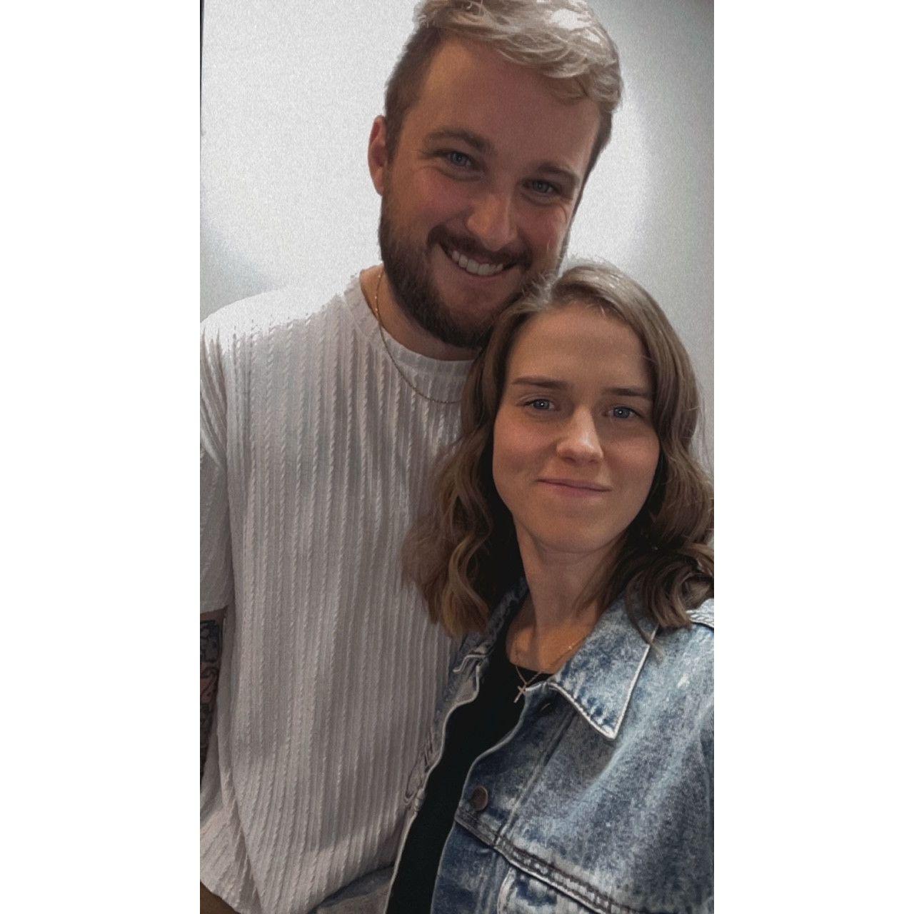This selfie was taken right before our first date! Told the restaurant it was our anniversary, ended up buying rubber wedding bands for a free dessert, now we're trading them in for the real things!