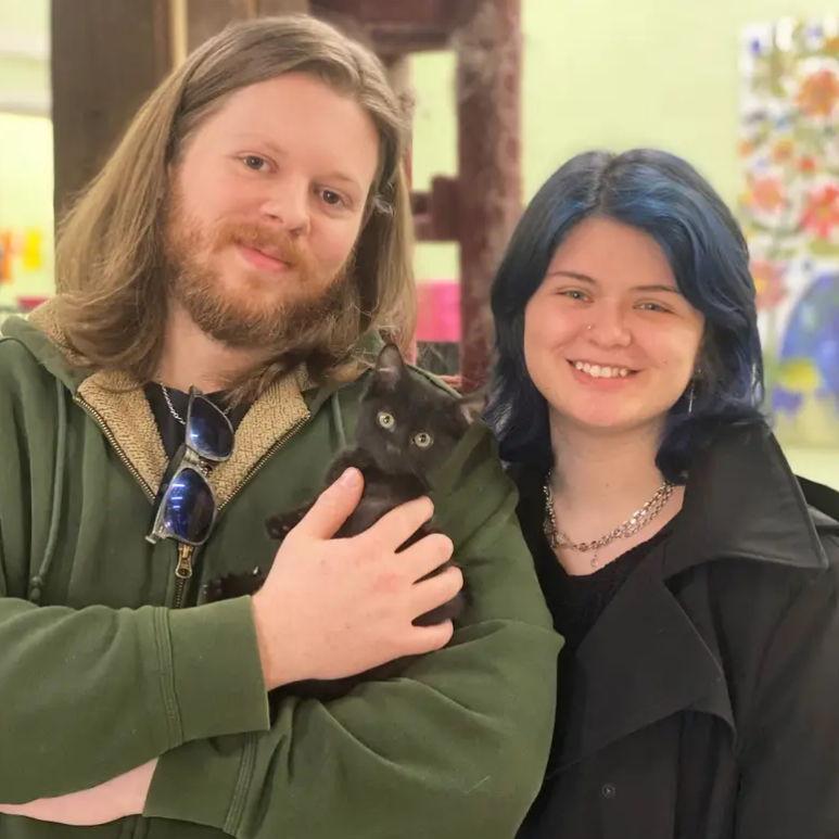 Us adopting our kitten, Marceline (a day before we got engaged)