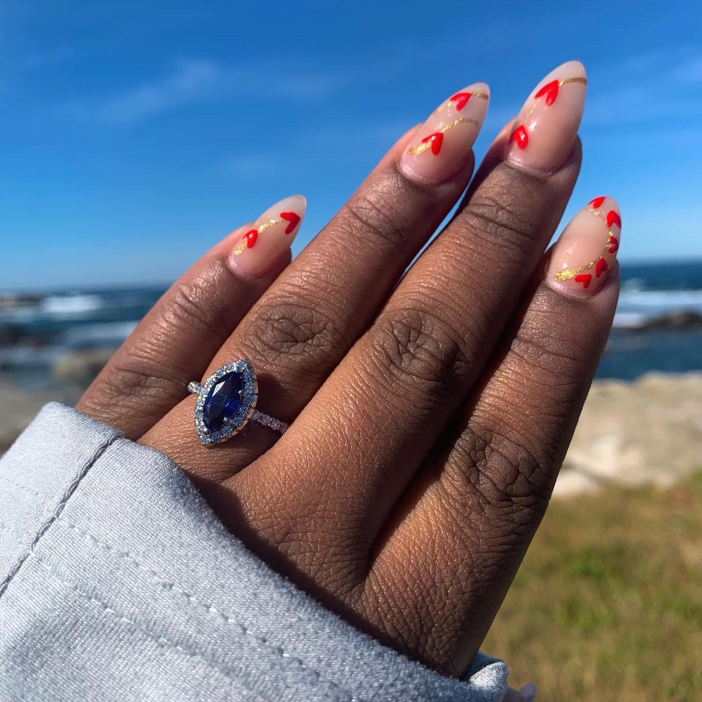 The real hero here is the person that did Kiki's nails prior to the proposal.