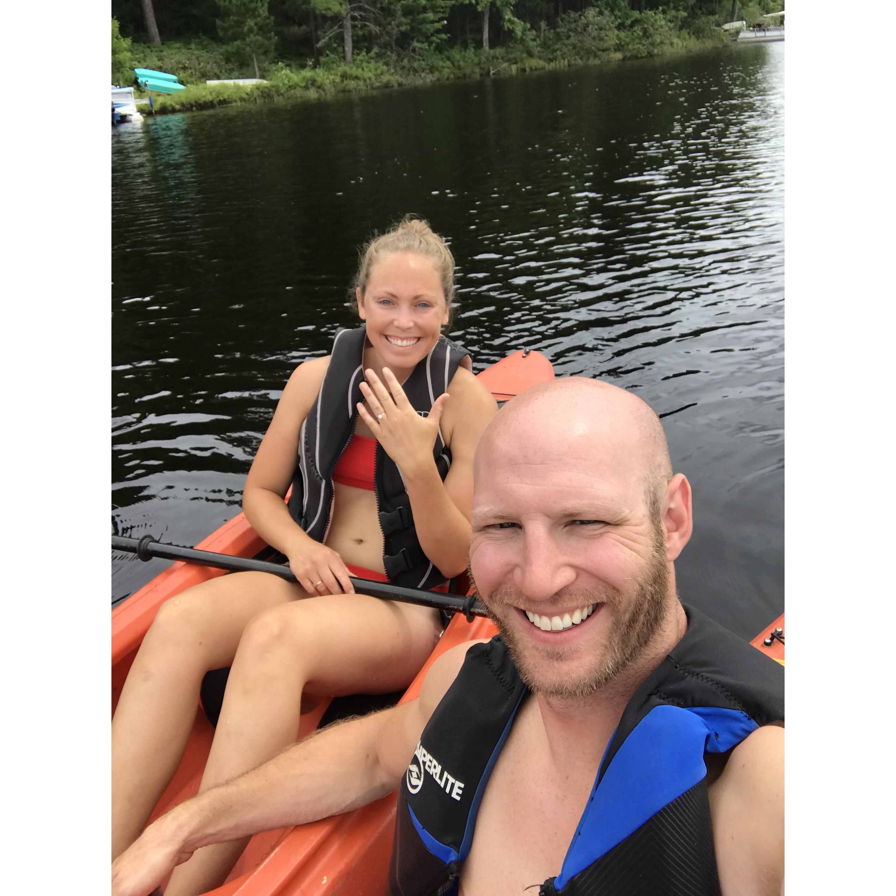 Enjoying the first full day of engagement by kayaking at the cabin :)