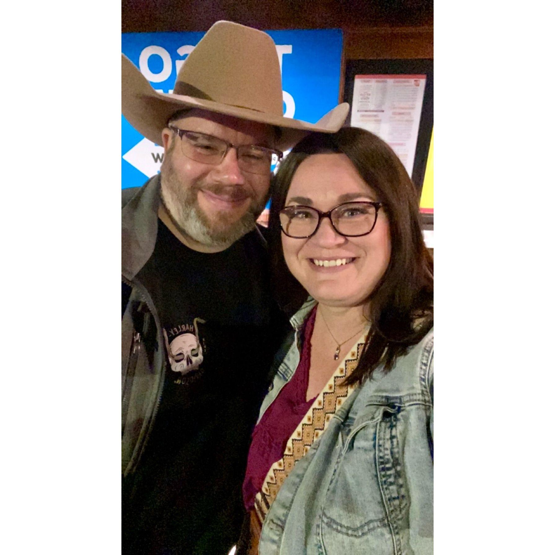 March 9, 2024: Waiting for our table outside Texas Roadhouse. Neither of the kids would take a picture with me so Kody jumped in.