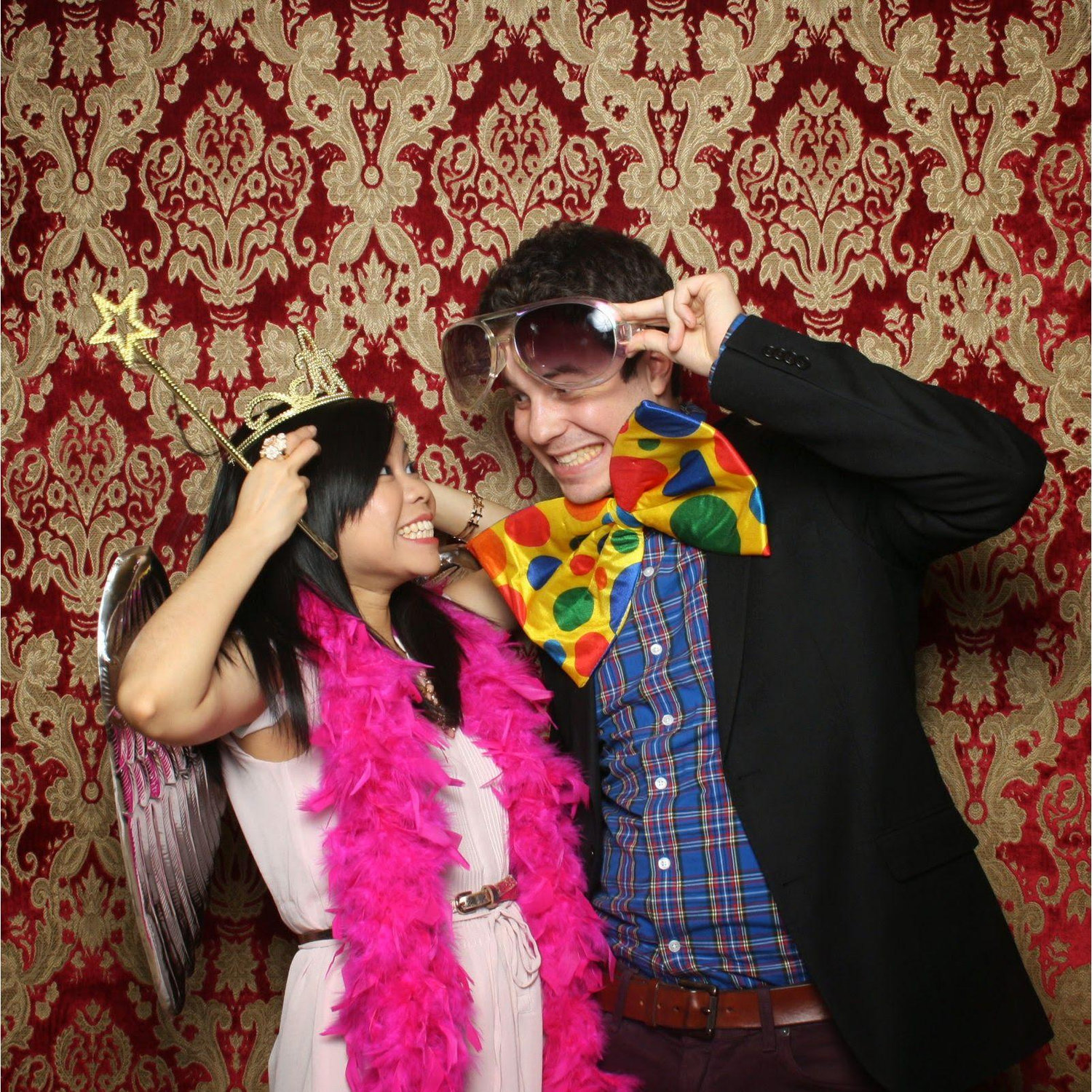 Us in the photo booth at our friends Will and Chris' wedding. A sign of things to come!