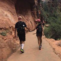 Hiking in Zion National Park on one of our trips to Utah.