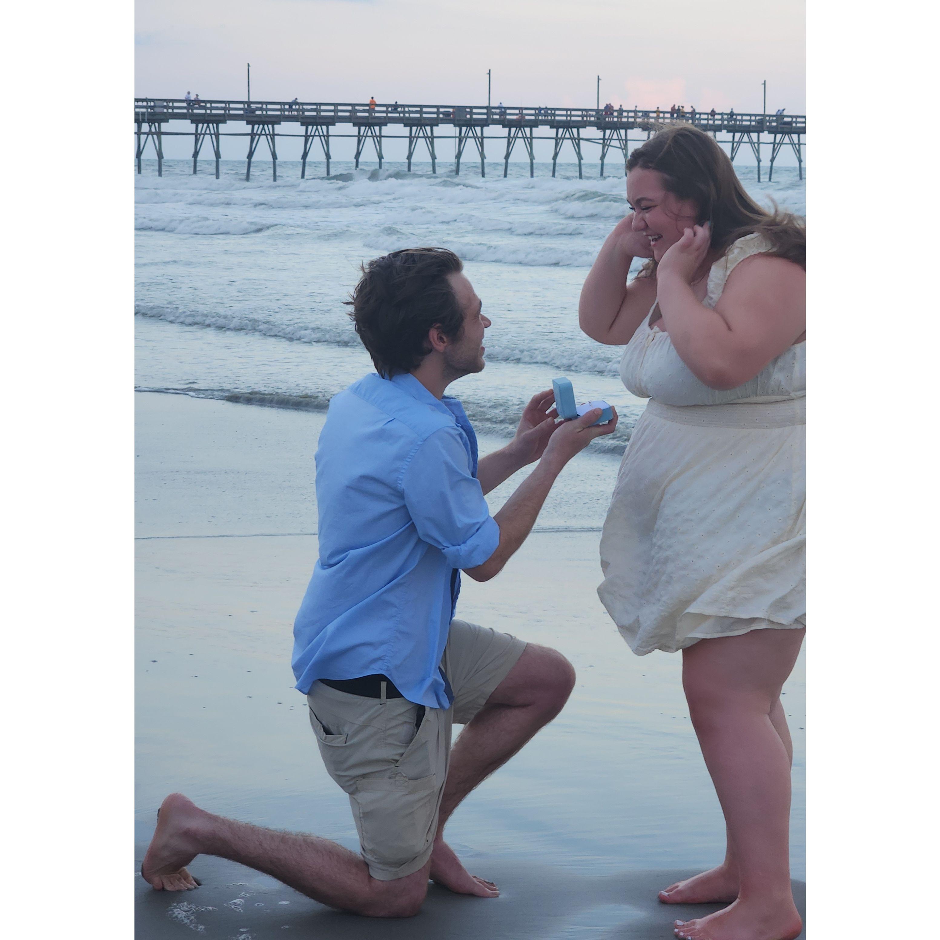 When Zeb proposed to Bella at Sunset Beach, NC in 2023