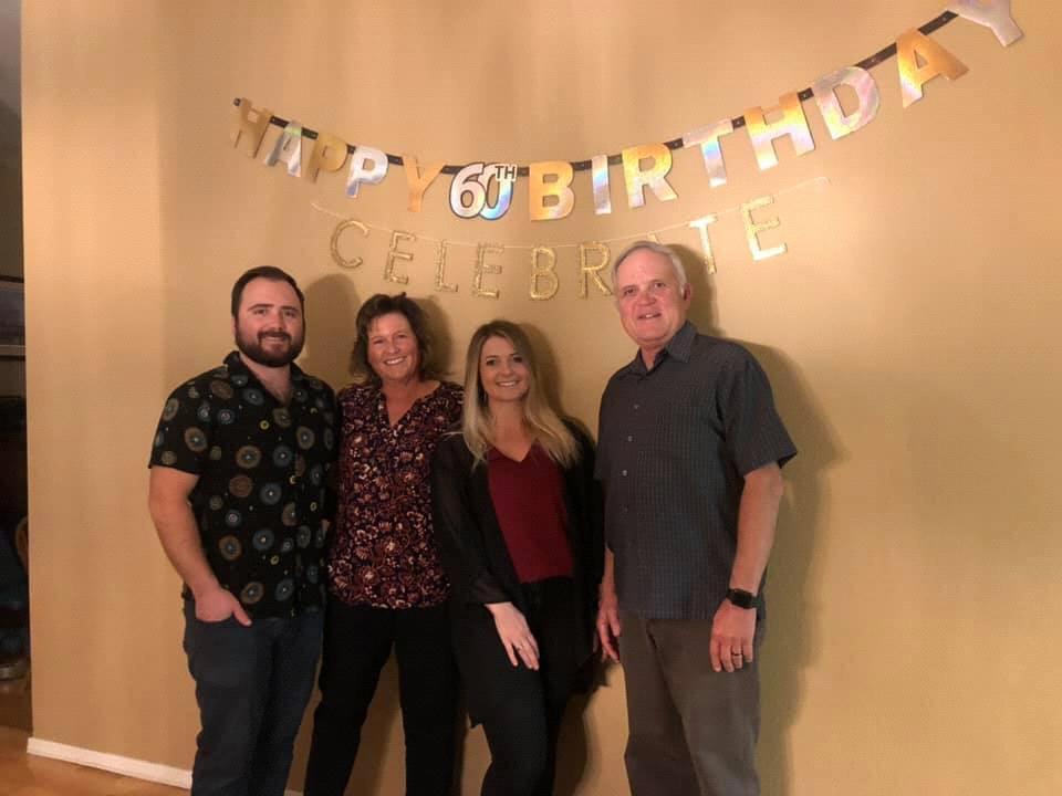 Kyle, mom Denise, sister Erin, and dad Brooke