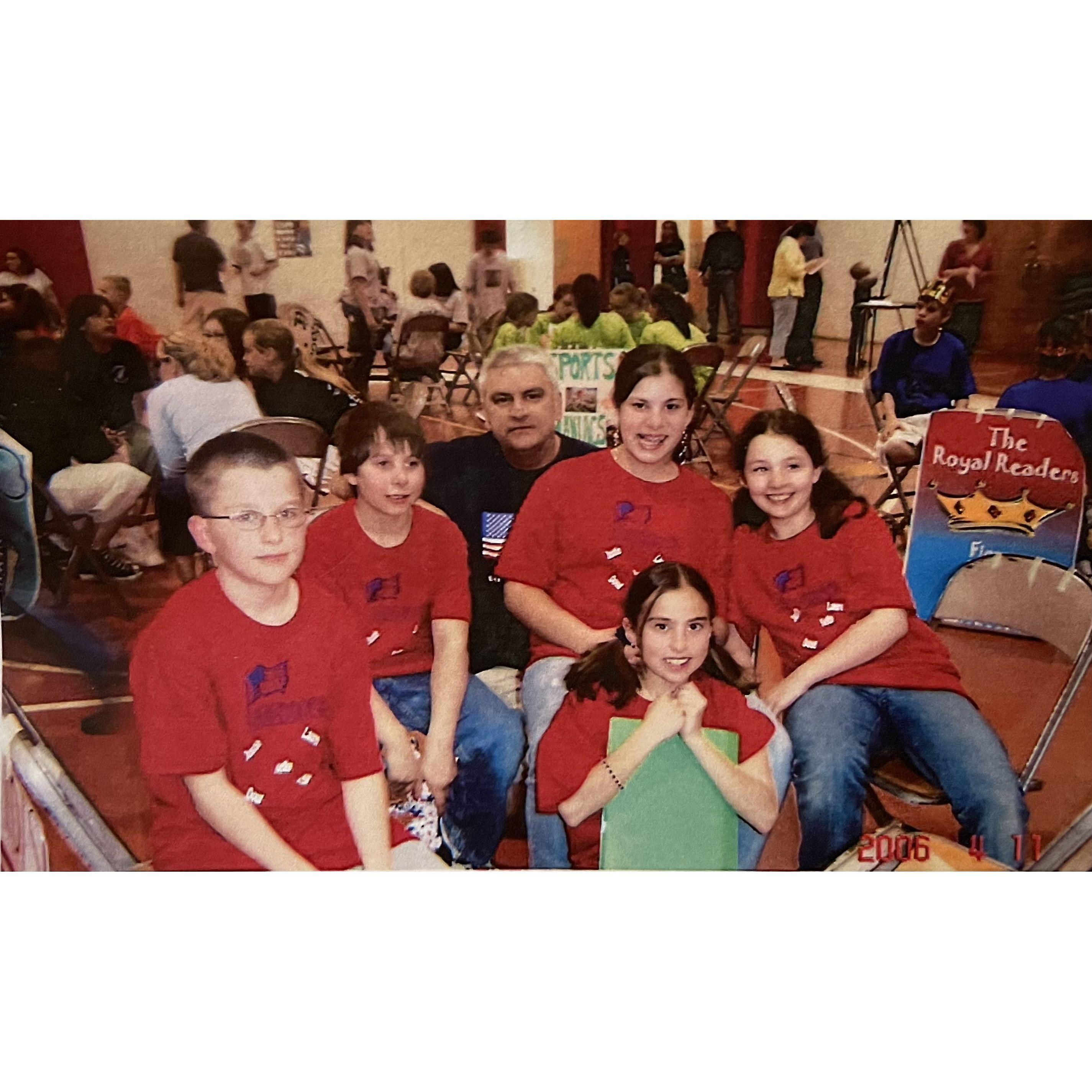 Our very first photo - when Lauren forced Doug to be on her Battle of the Books team in 5th grade (2005). Lauren is in front with the green folder and Doug is on the left with the glasses.