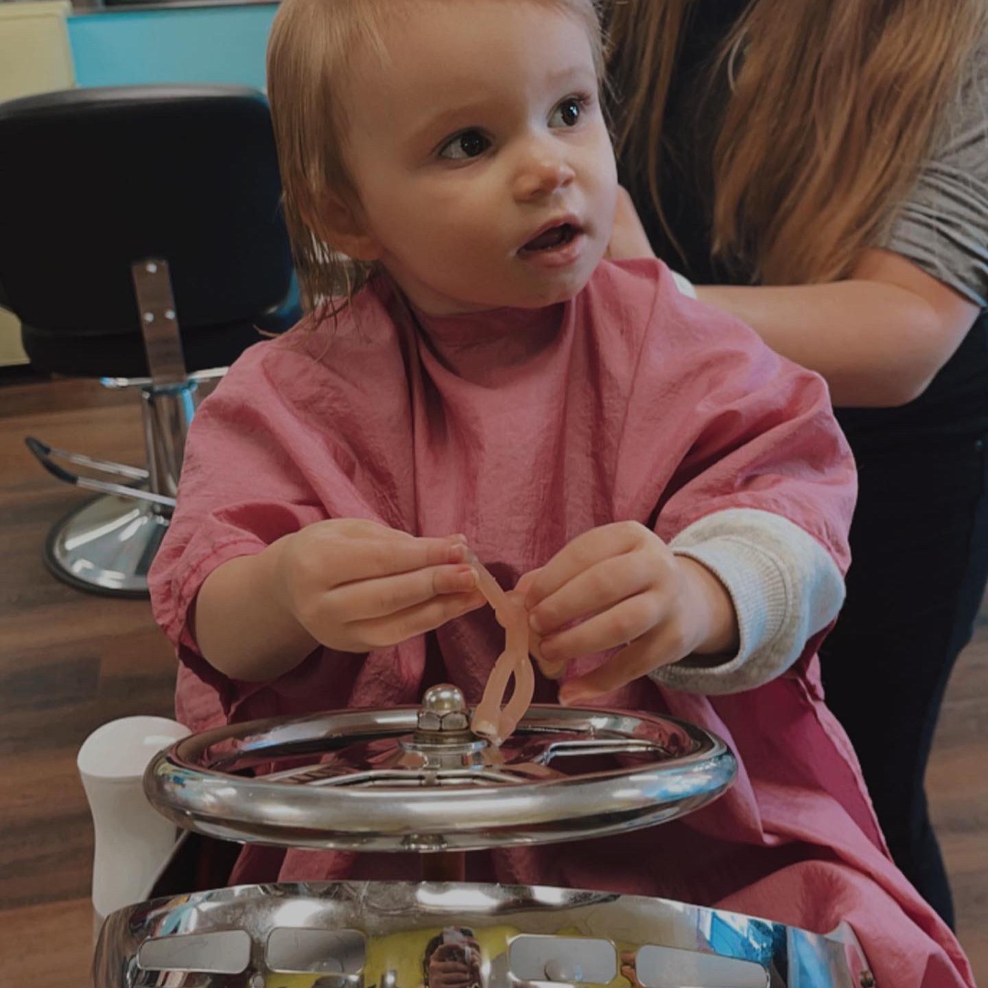 Evelyn’s first haircut!